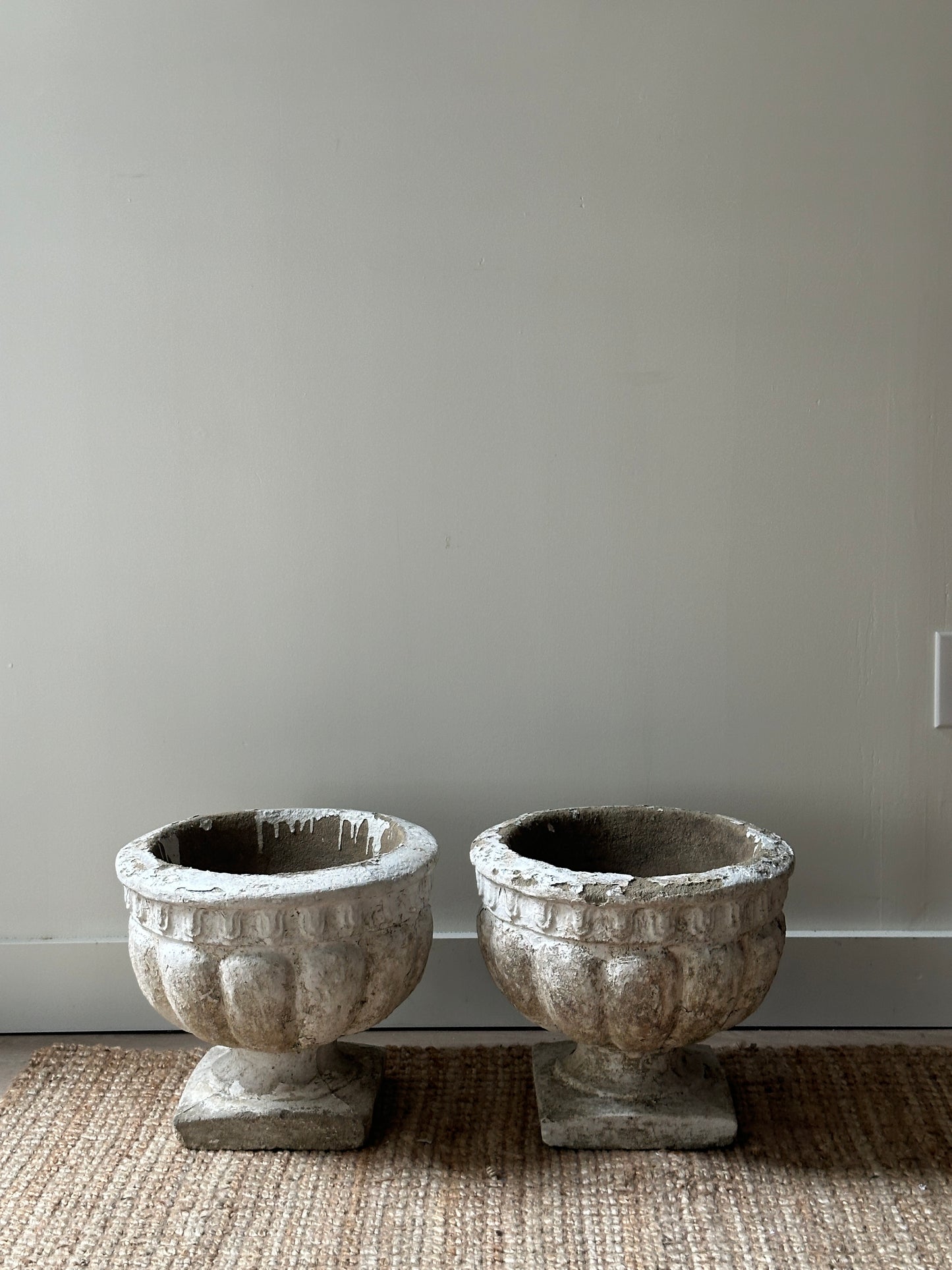 Round concrete planters. Sold individually.