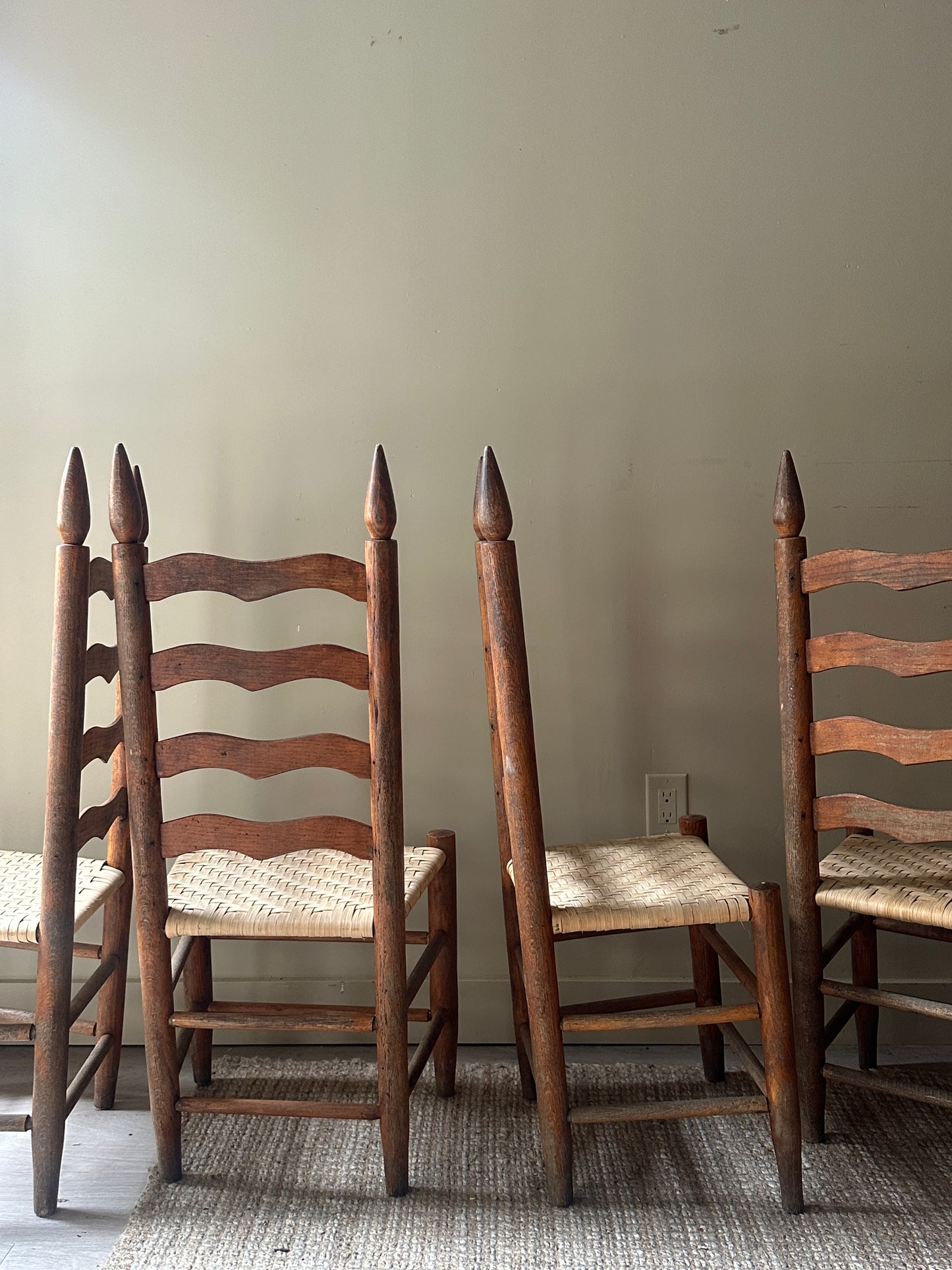 Woven ladder back chairs. Sold as set of 4.
