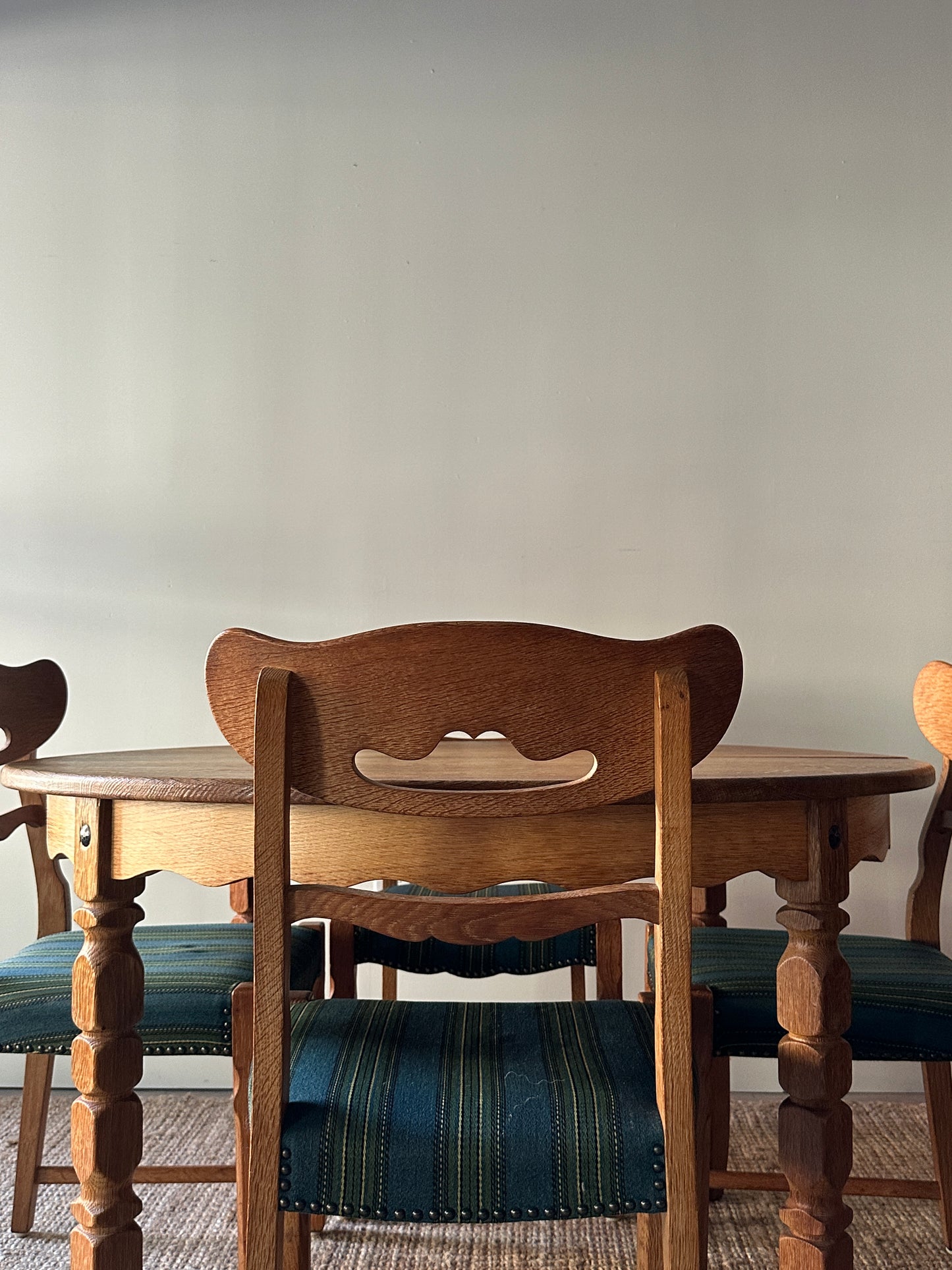 Carved block leg dining table with leaf
