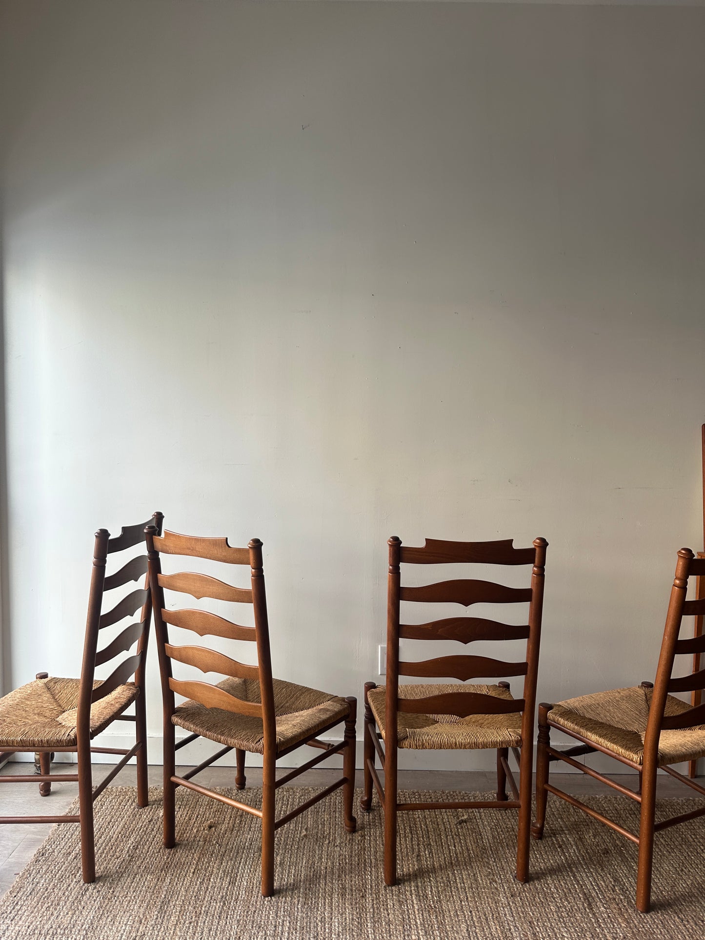 Set of 4 ladder back chairs. Sold as a set.