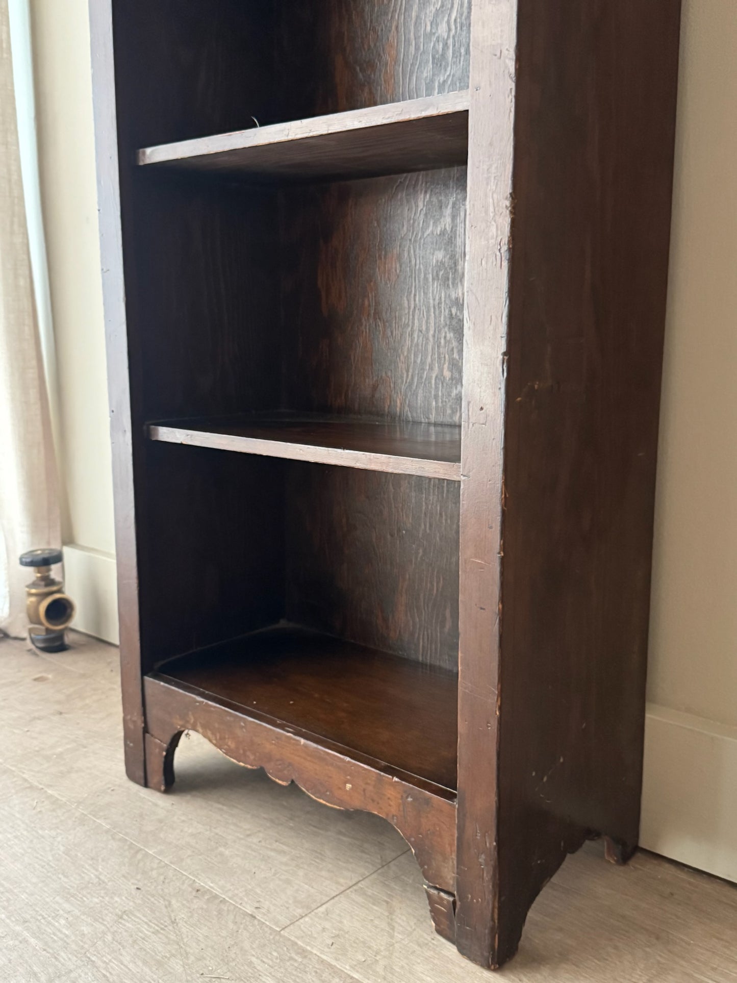 Narrow stained pine shelf