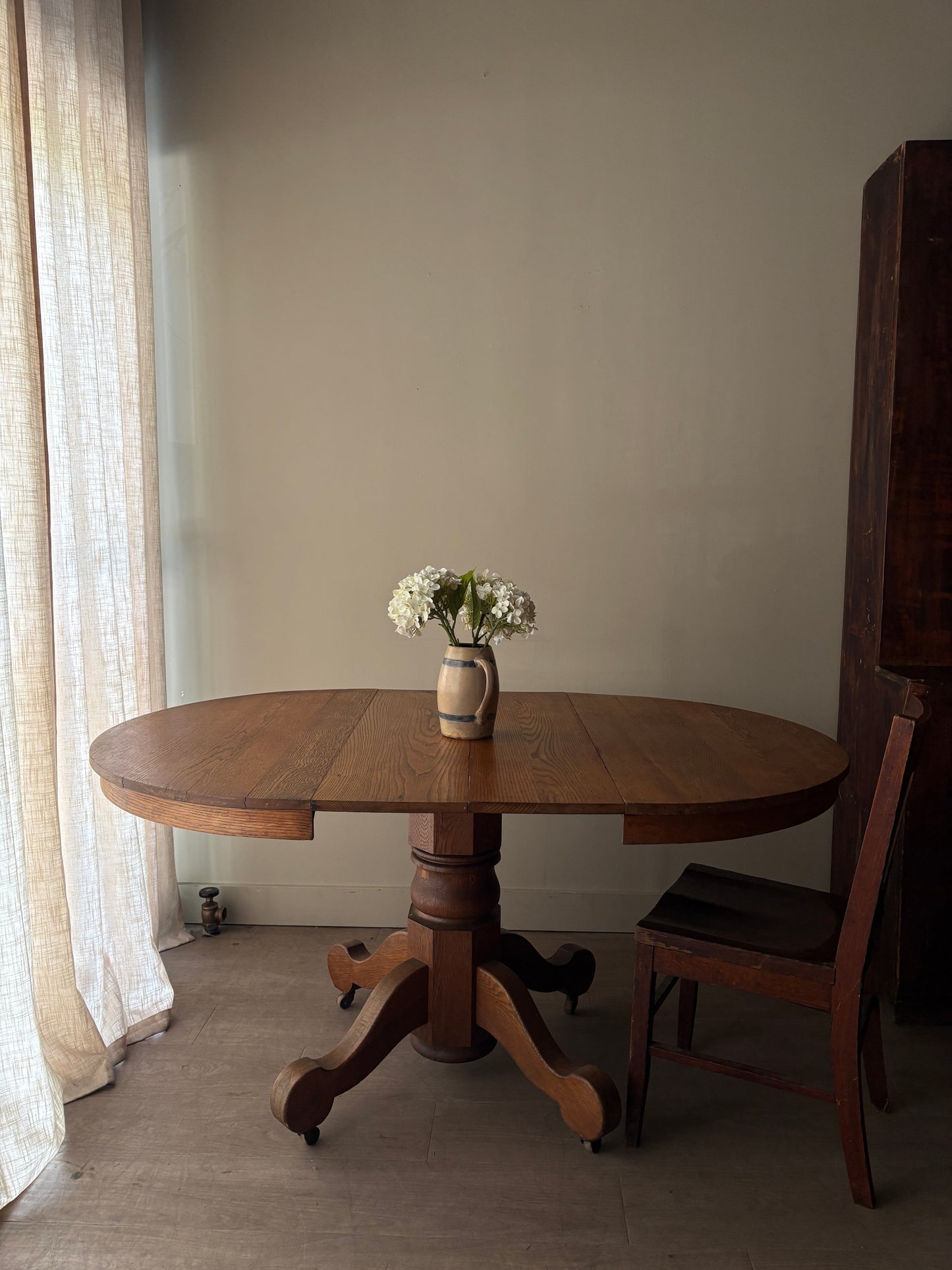 Oak dining table with extensions