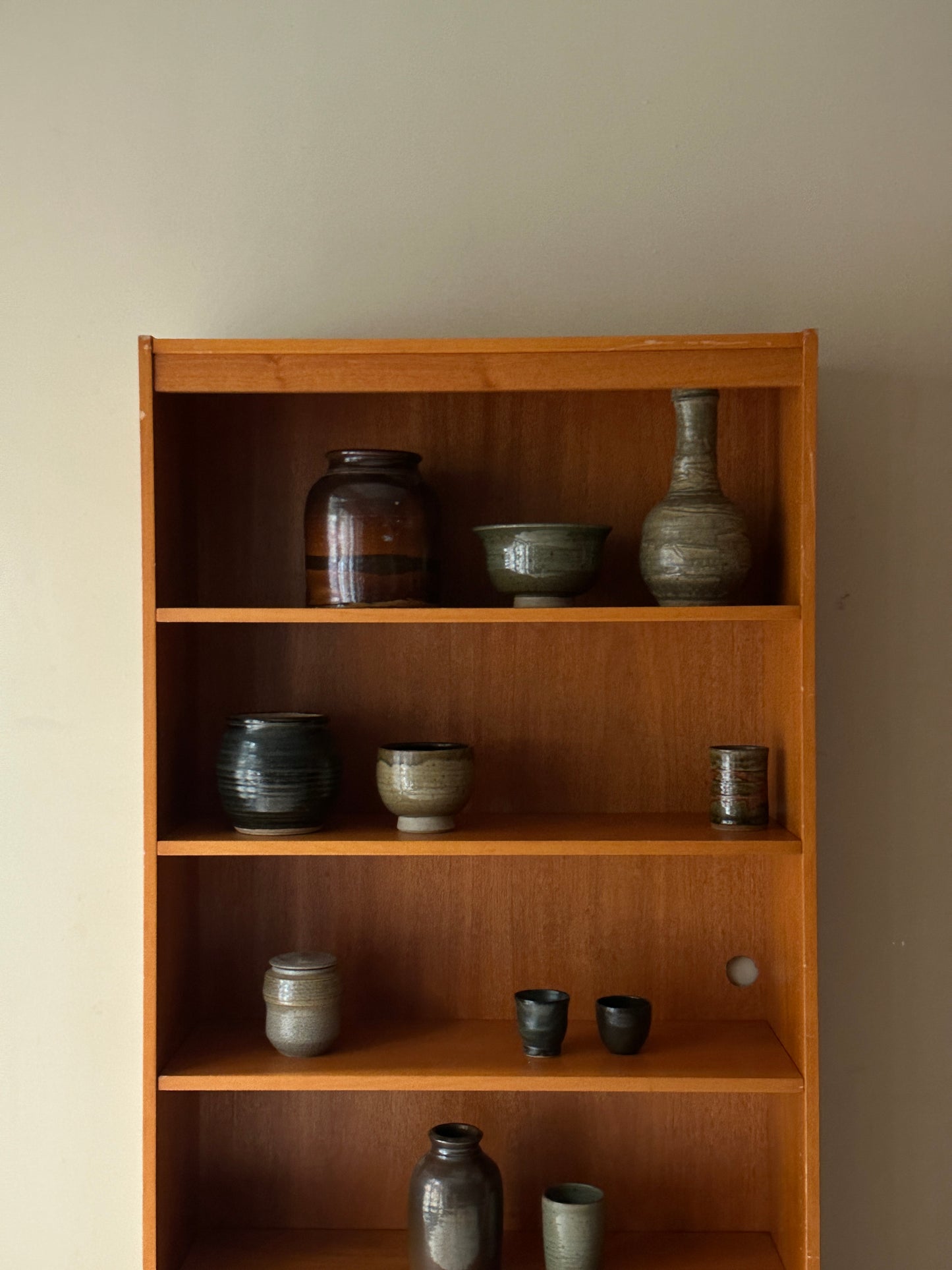 Teak bookshelf (outlet holes on right)