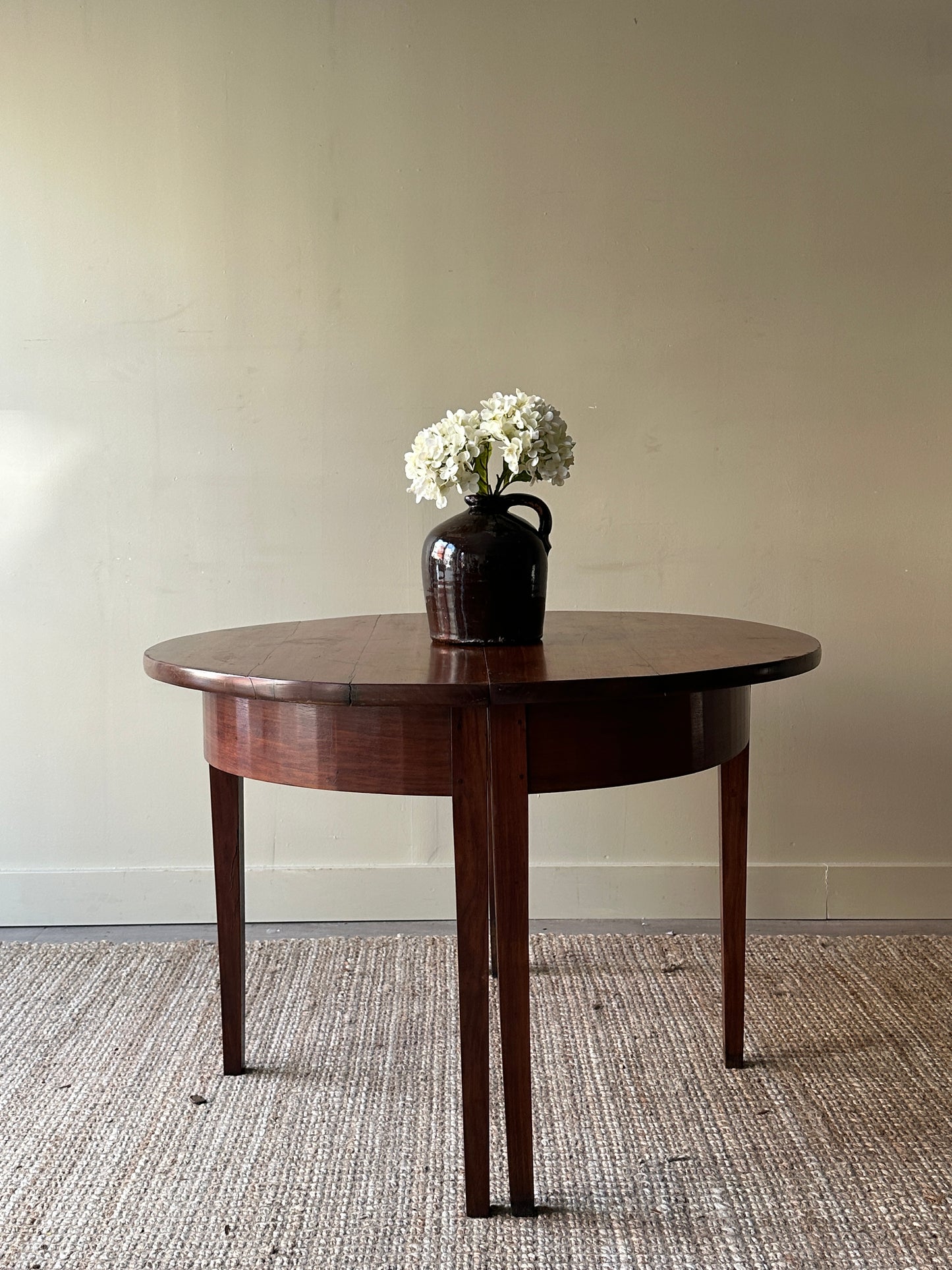 Half moon entryway tables. Sold individually.