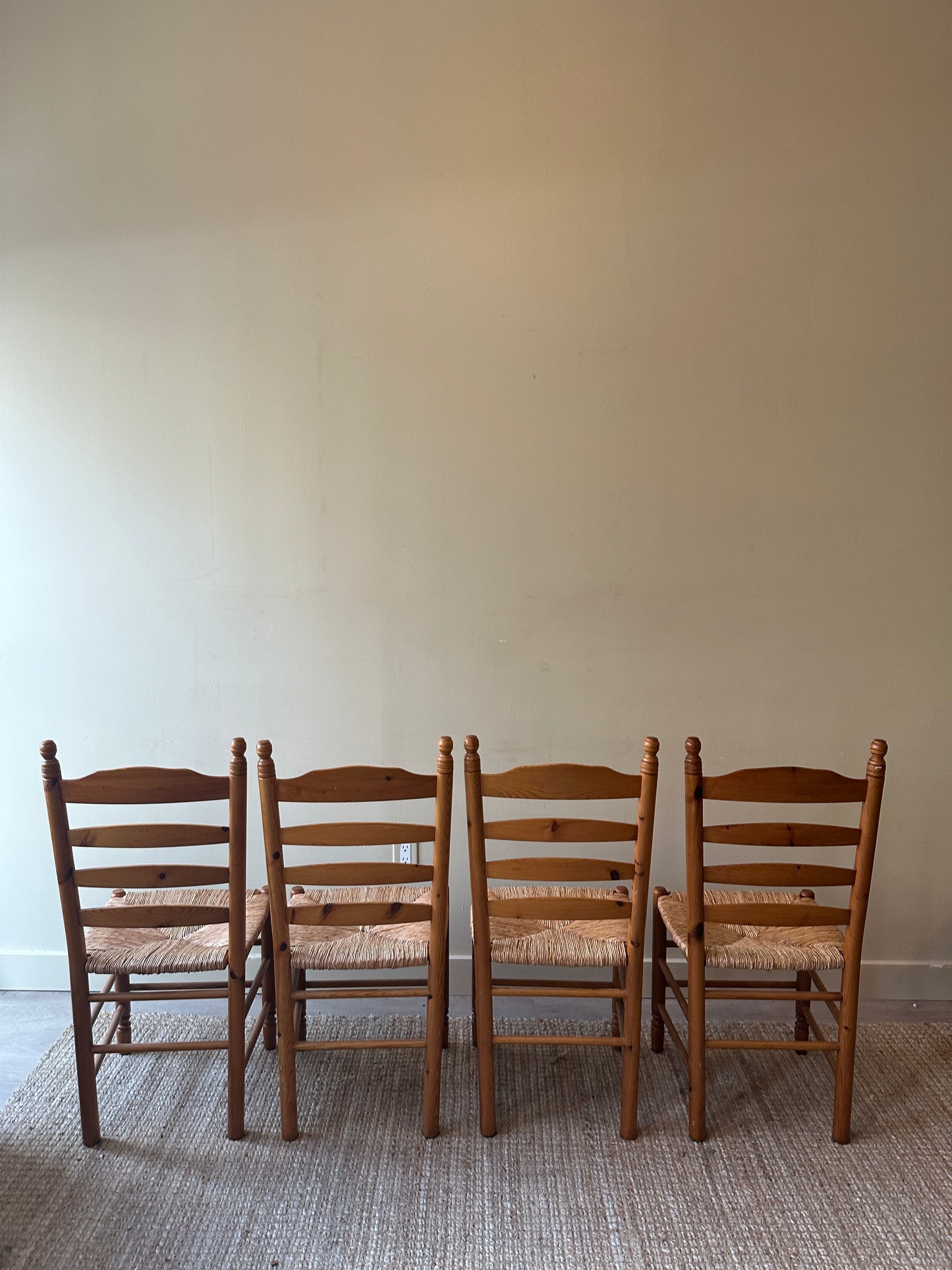 4 rush chairs. Sold as a set of four.