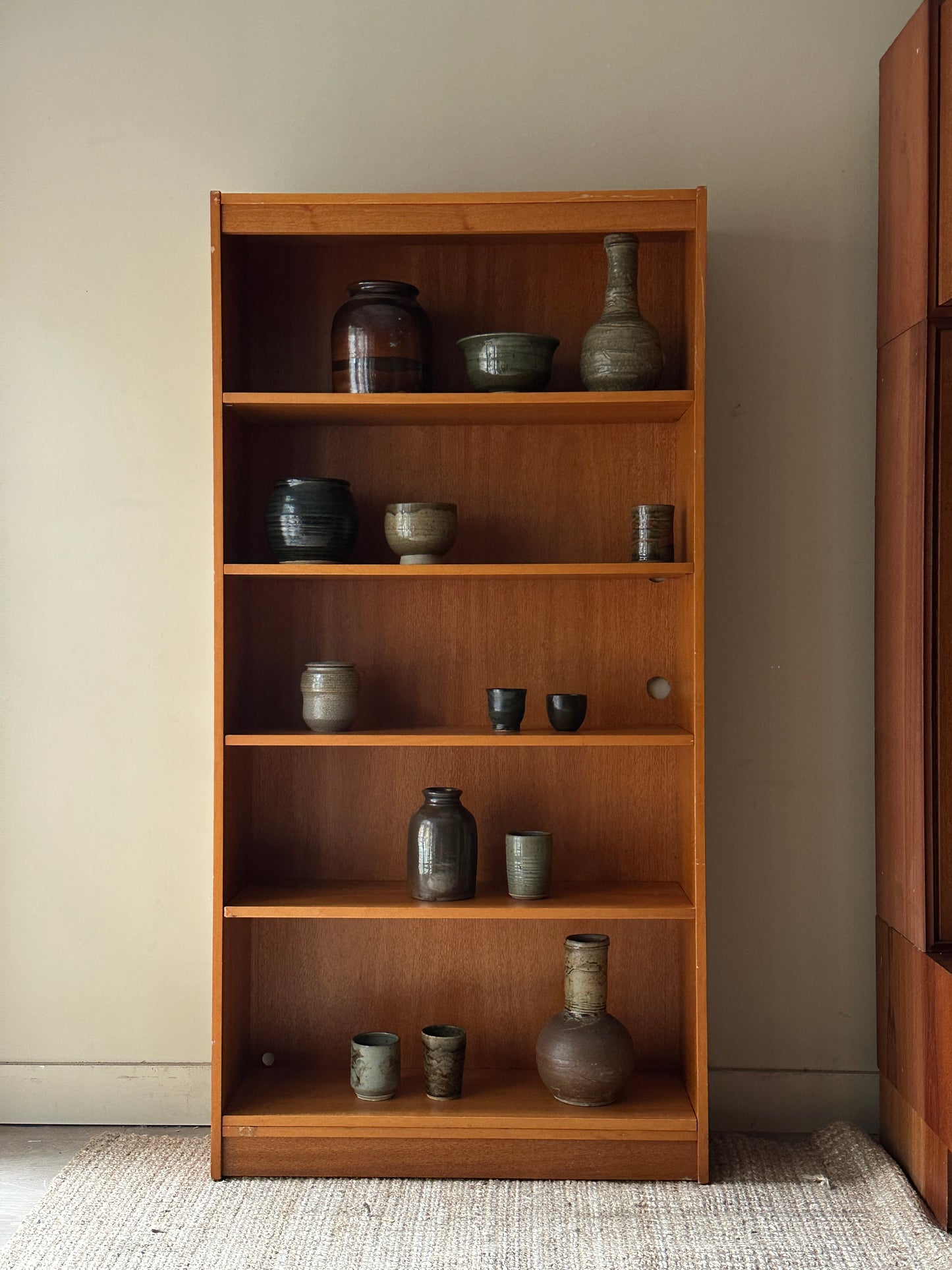 Teak bookshelf (outlet holes on right)