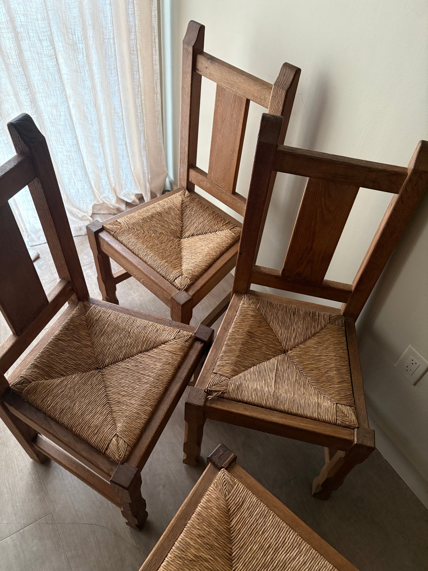 Belgian De Puydt oak & rush dining chairs. Sold in pairs.