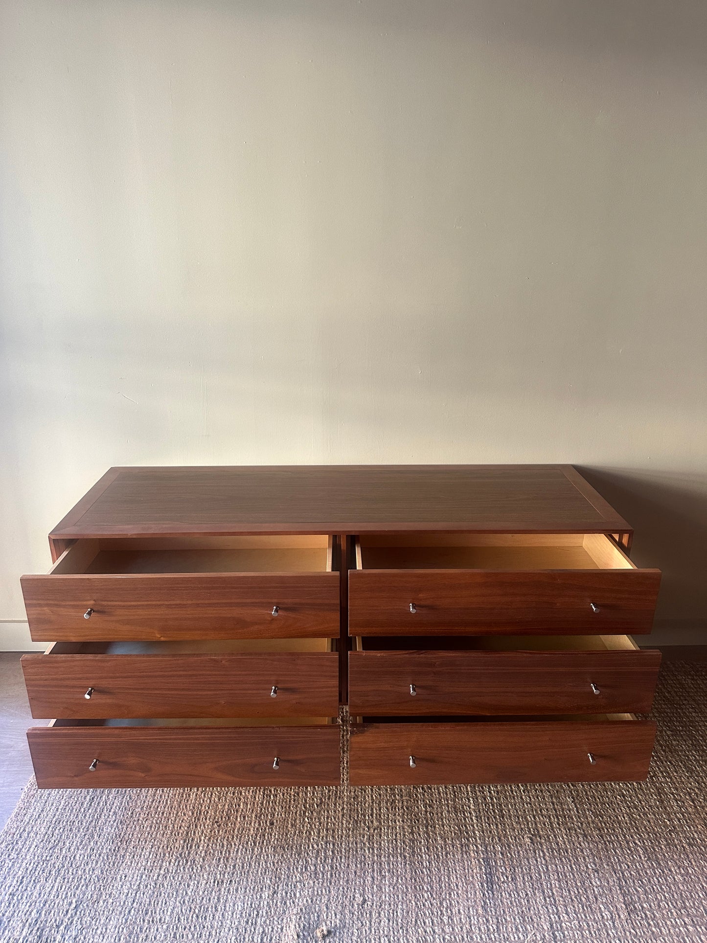 Walnut credenza with chrome knobs
