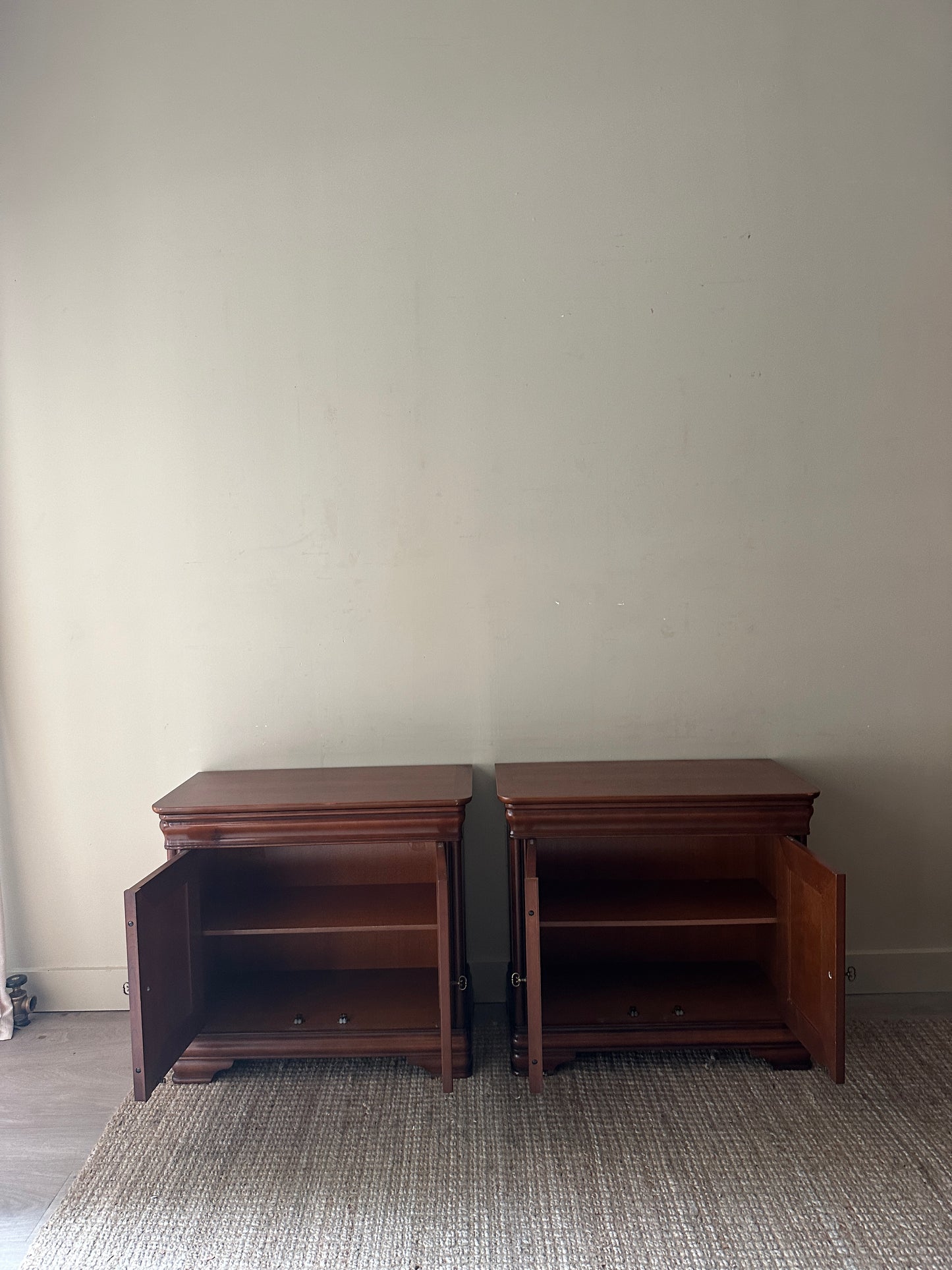 Pair of walnut nightstands. Sold together.