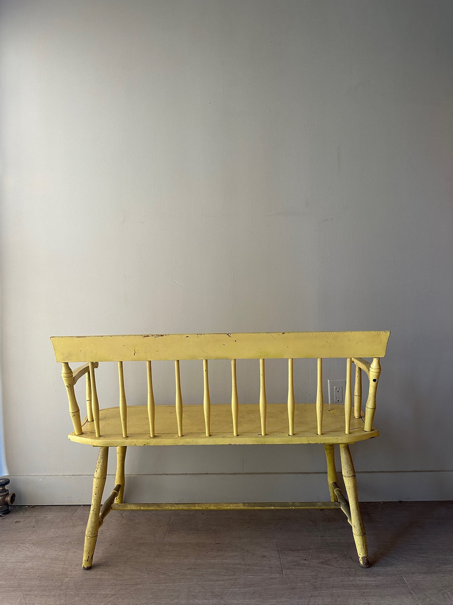 Yellow painted bench