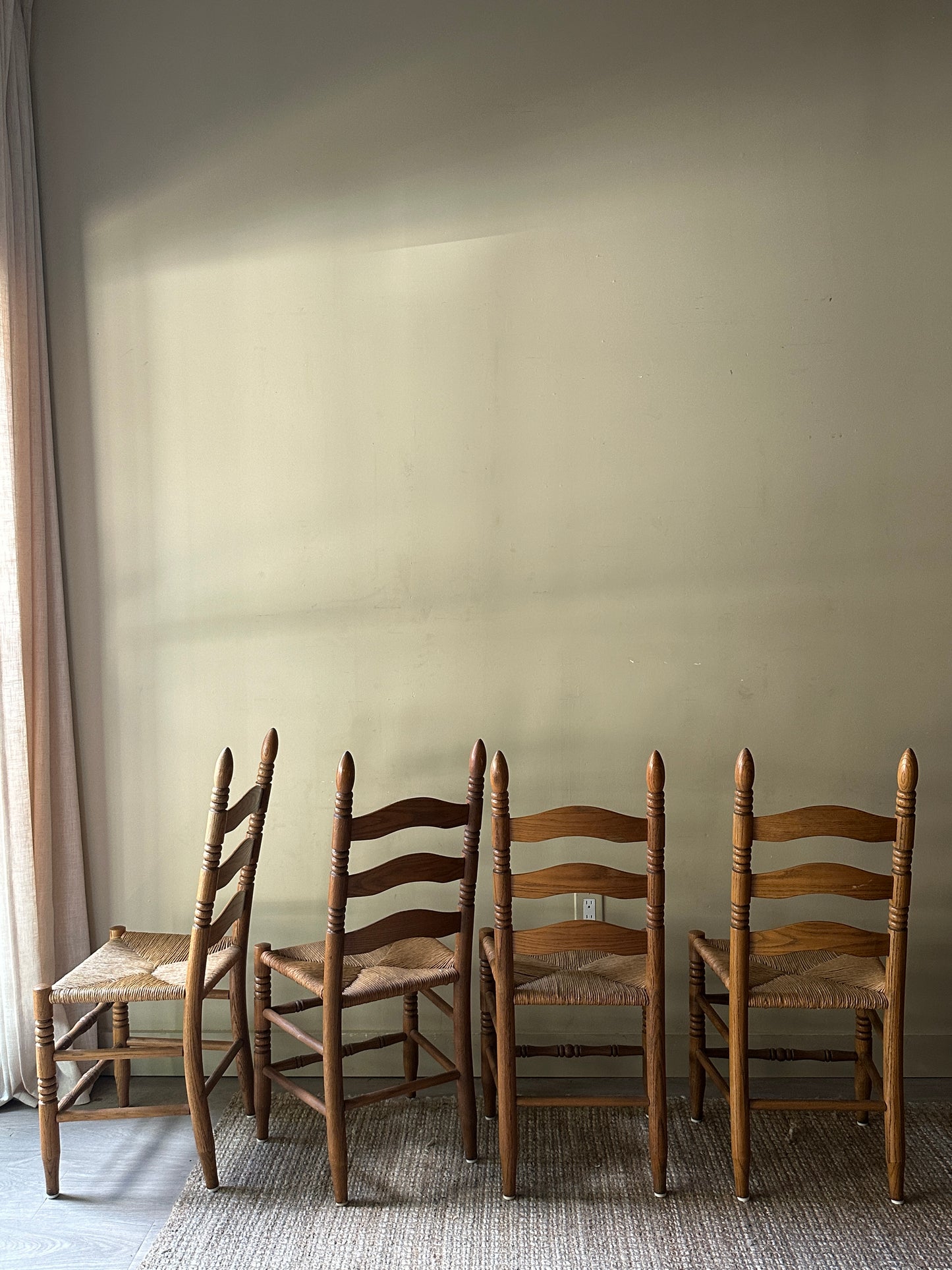 Ladder back chairs. Sold in pairs.