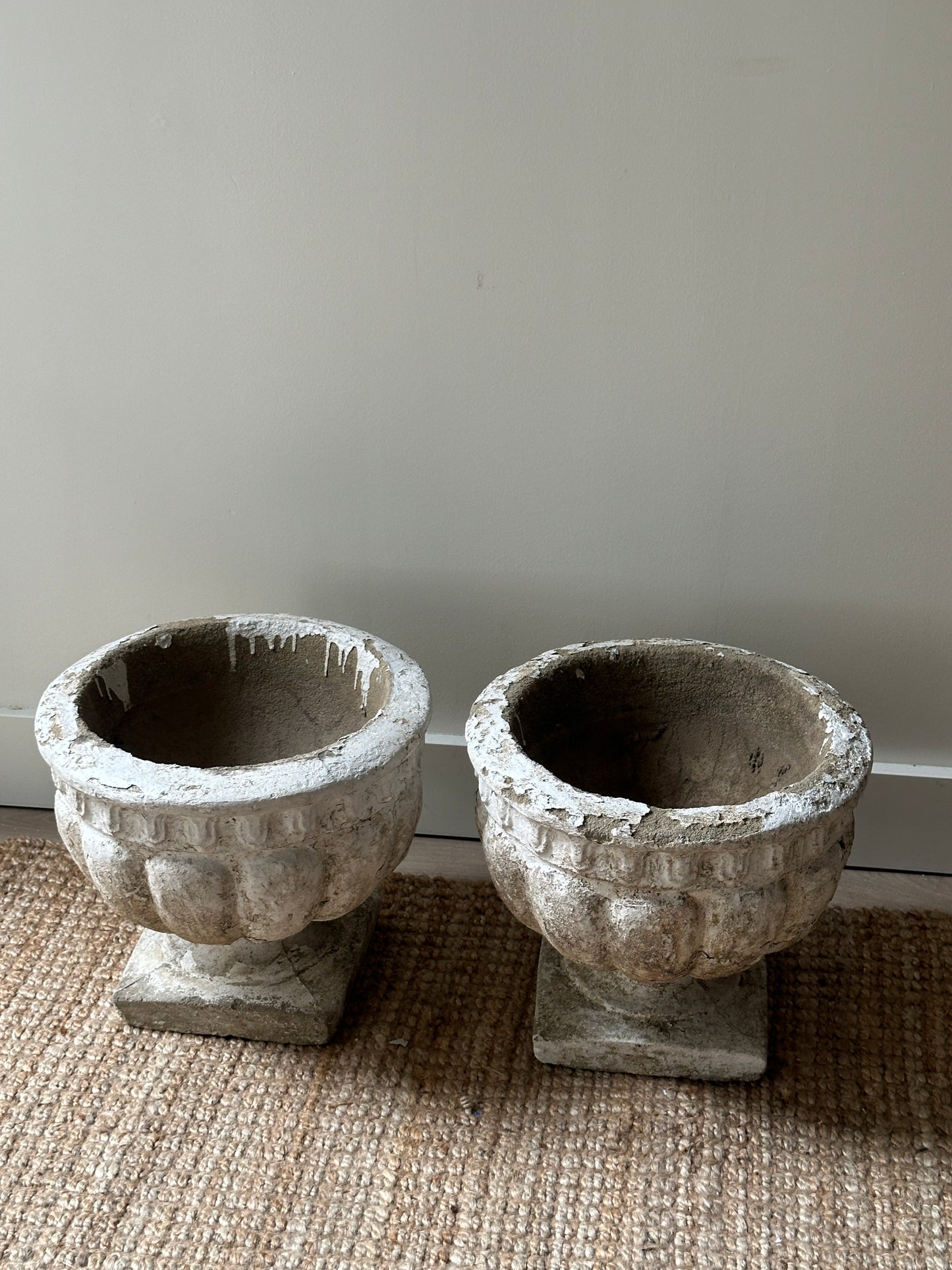 Round concrete planters. Sold individually.