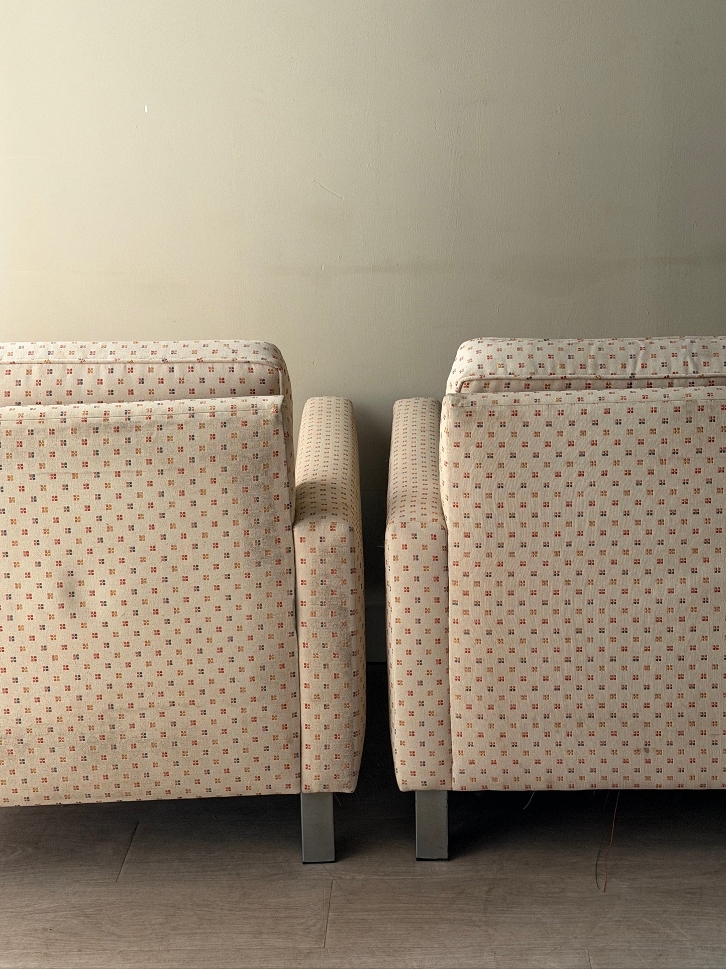 Upholstered chrome armchairs. Right.
