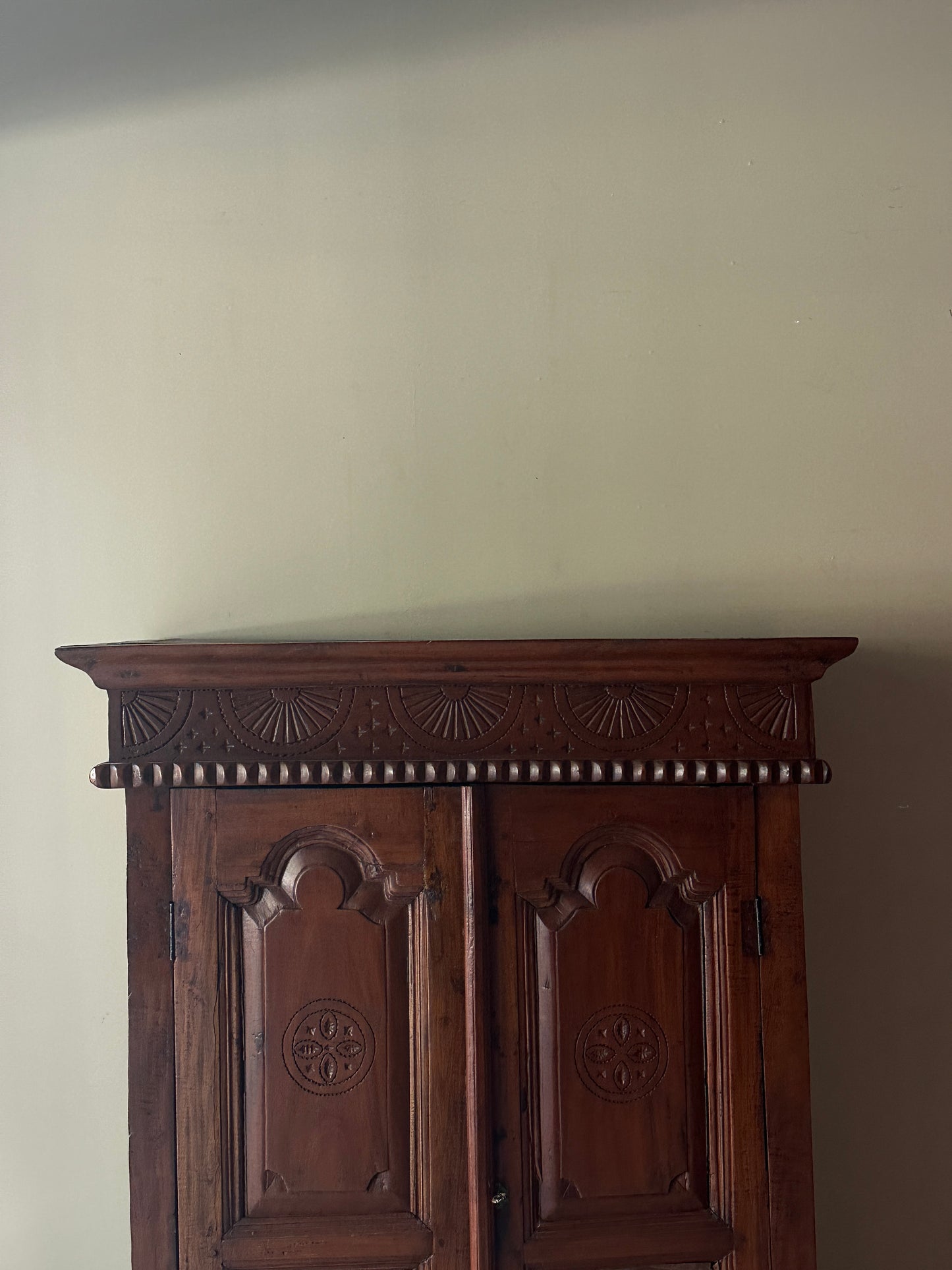 Carved pine cabinet