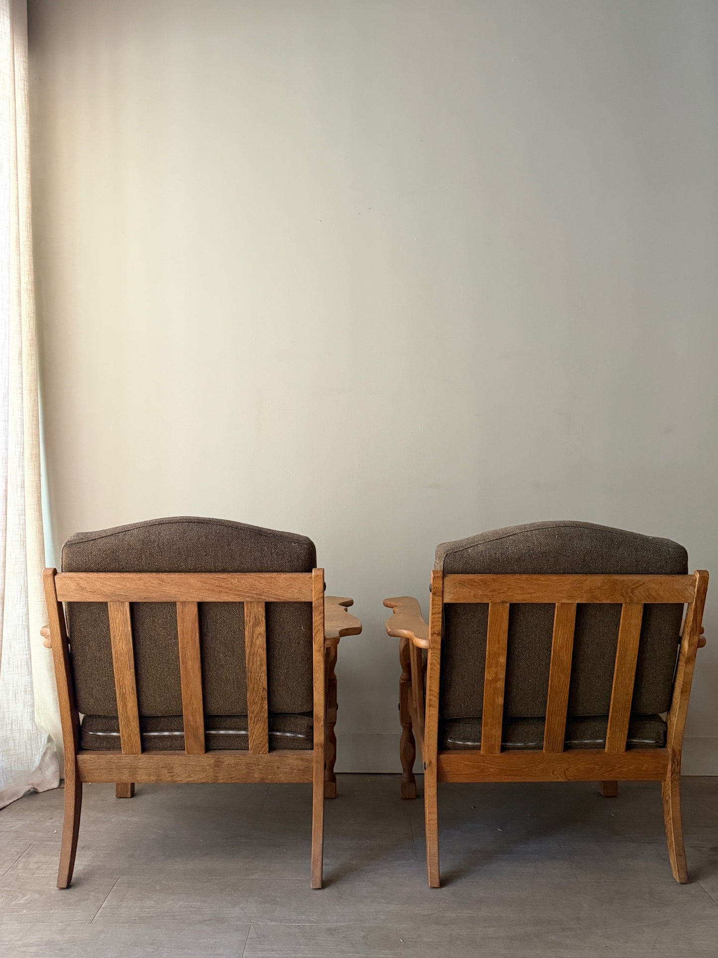 Danish oak lounge chairs. Sold individually.