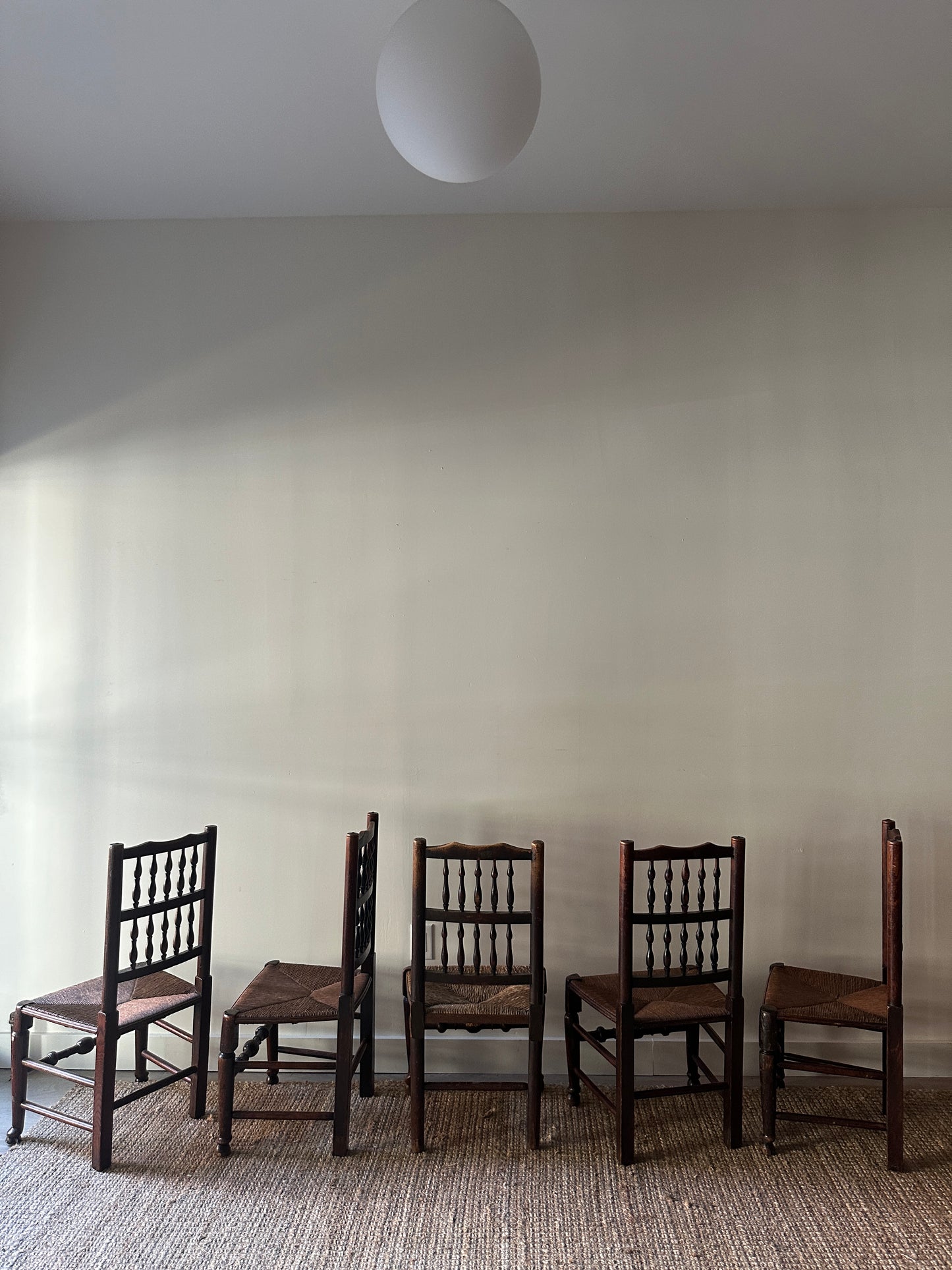 5 rush dining chairs. Sold individually.