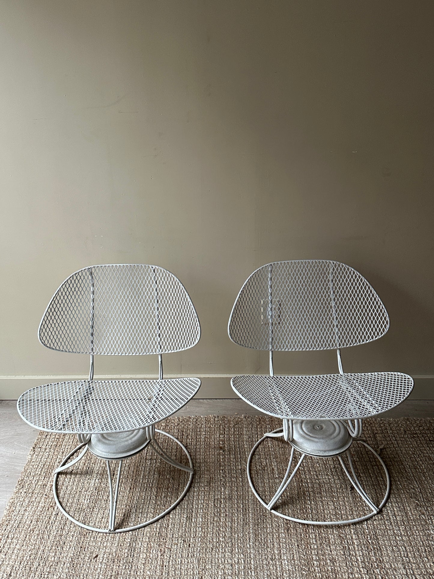 Homecrest metal clam shell swivel chairs. Sold as a set.