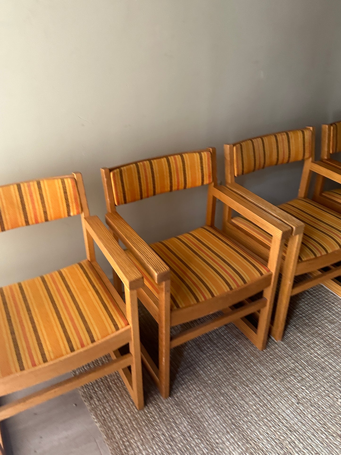 Oak armchairs. Sold individually.