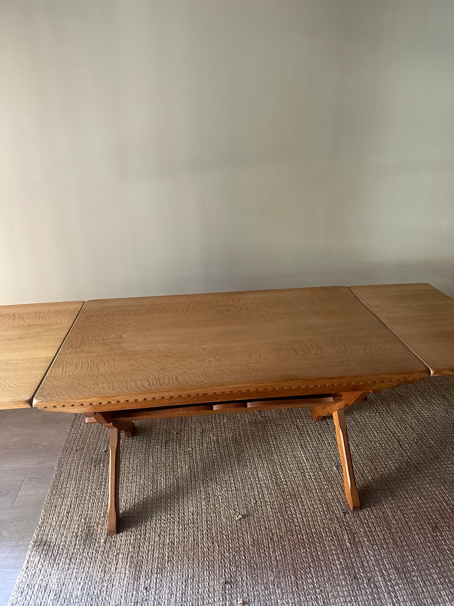 Danish oak dining table with removable leaves by Henning Kjaernulf