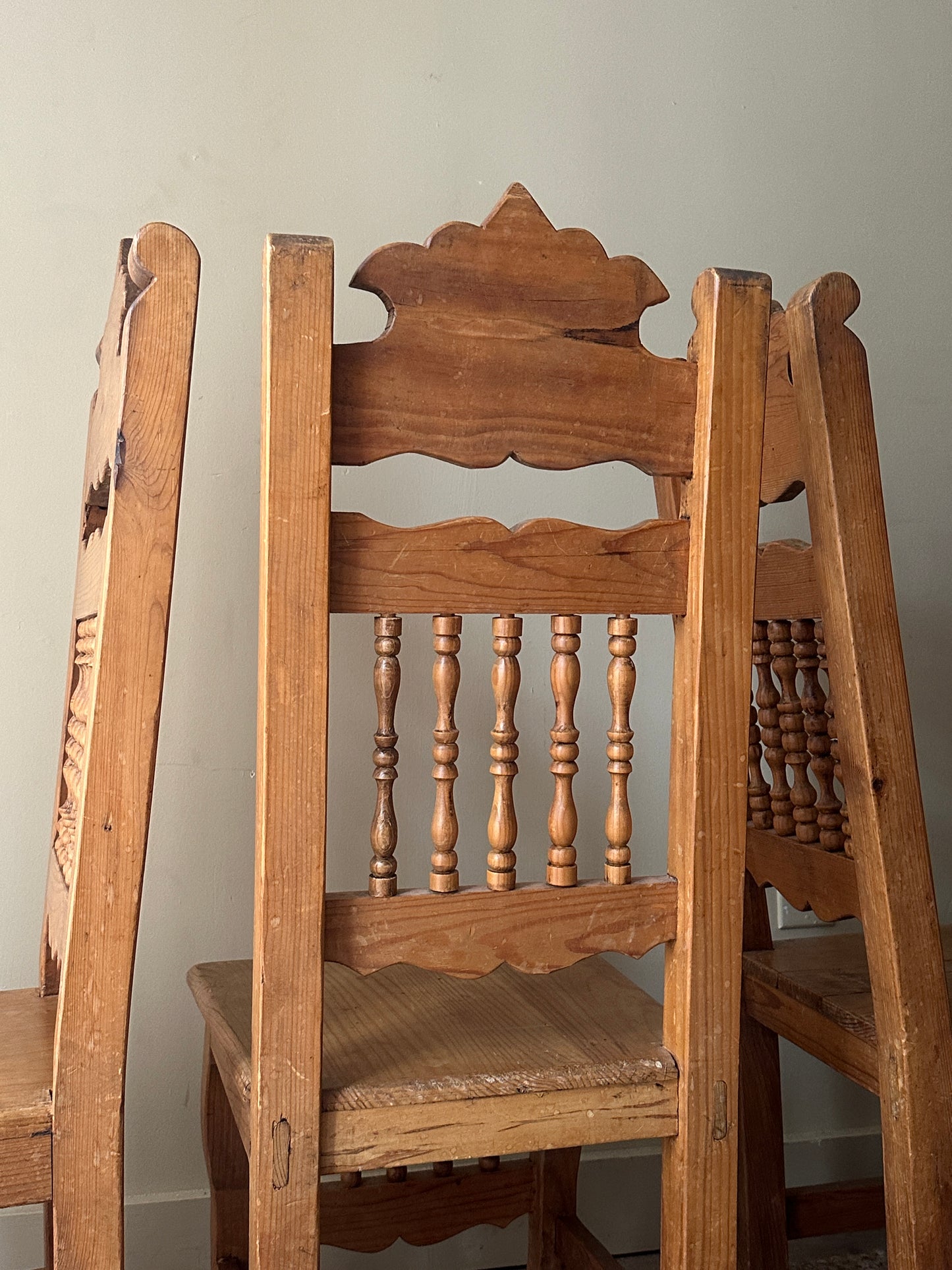 Hand carved pine dining chairs. (Sets of 2).
