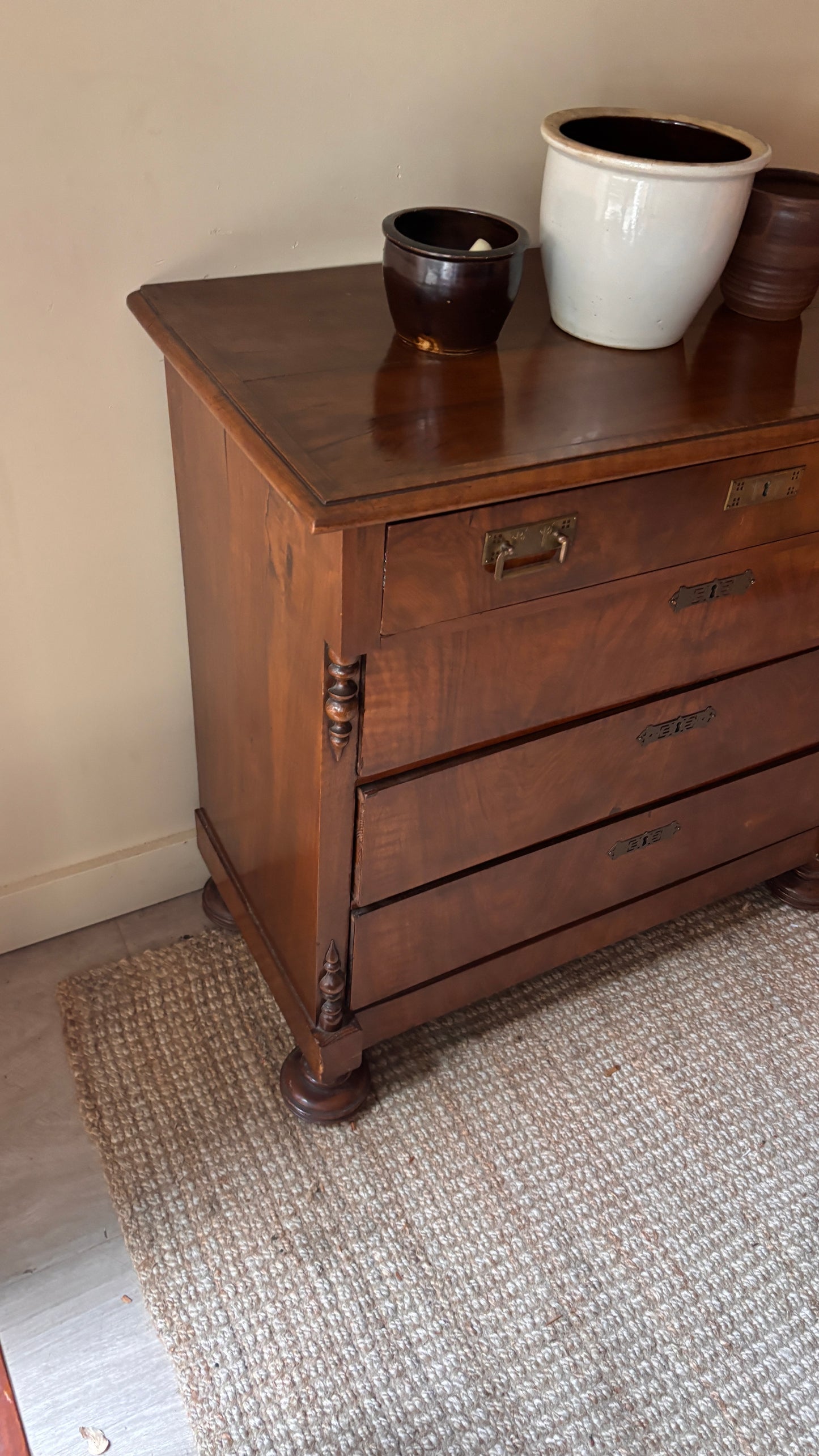 Walnut dresser with carved brass hardware