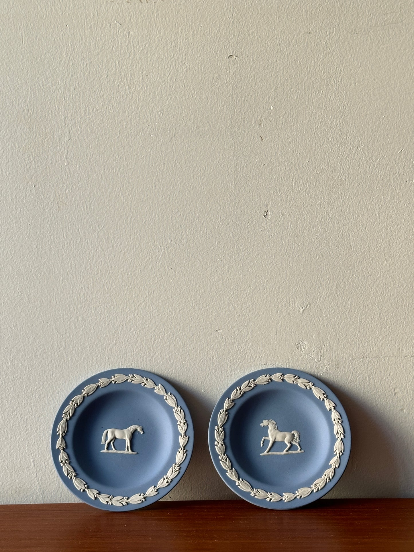 Wedgwood jasperware plates. Sold individually.