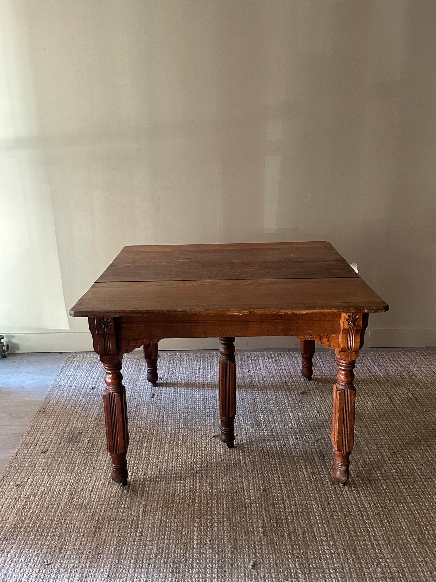 Oak carved dining table with leaf