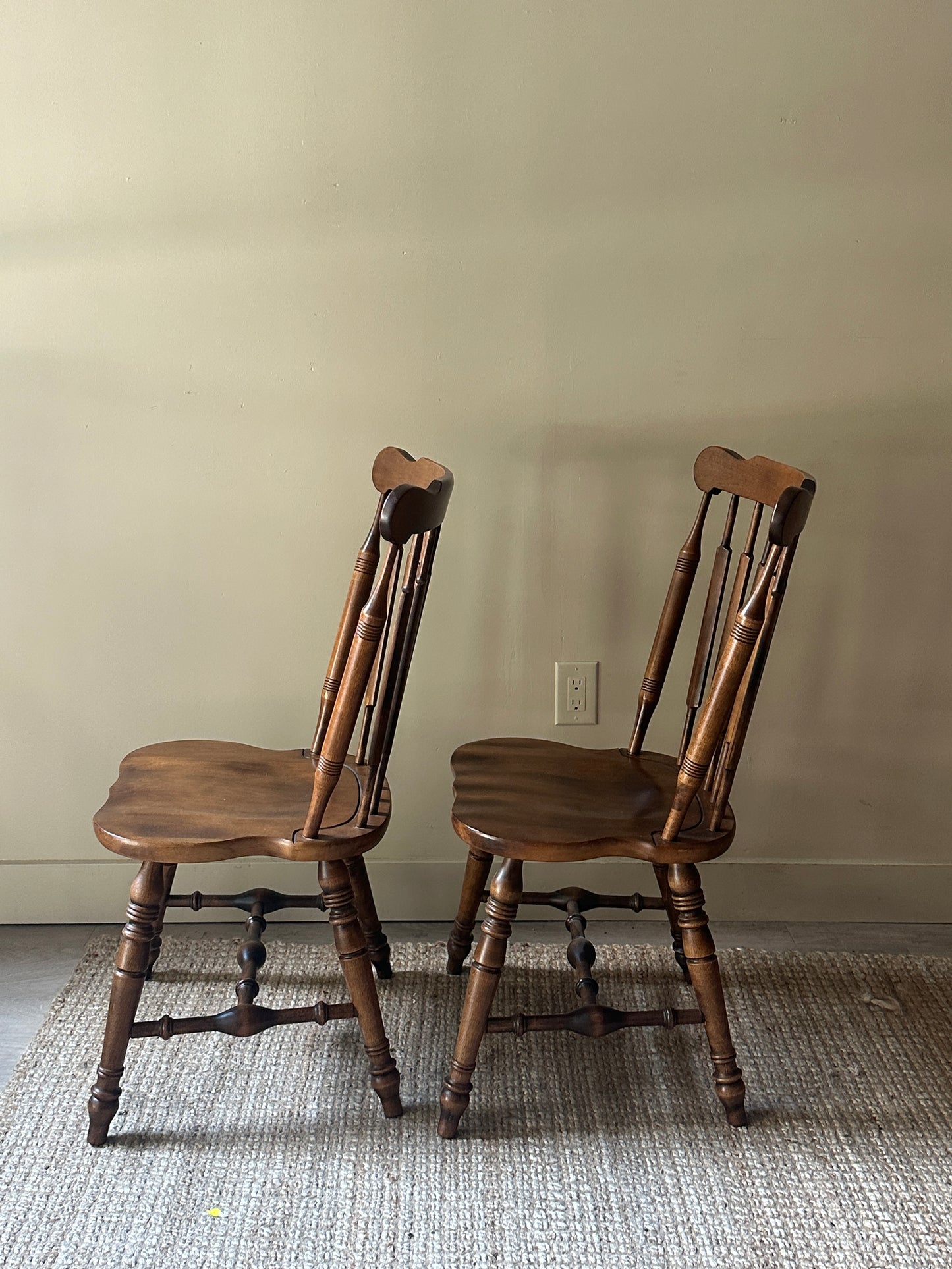 Windsor walnut chairs. Sold in pair.