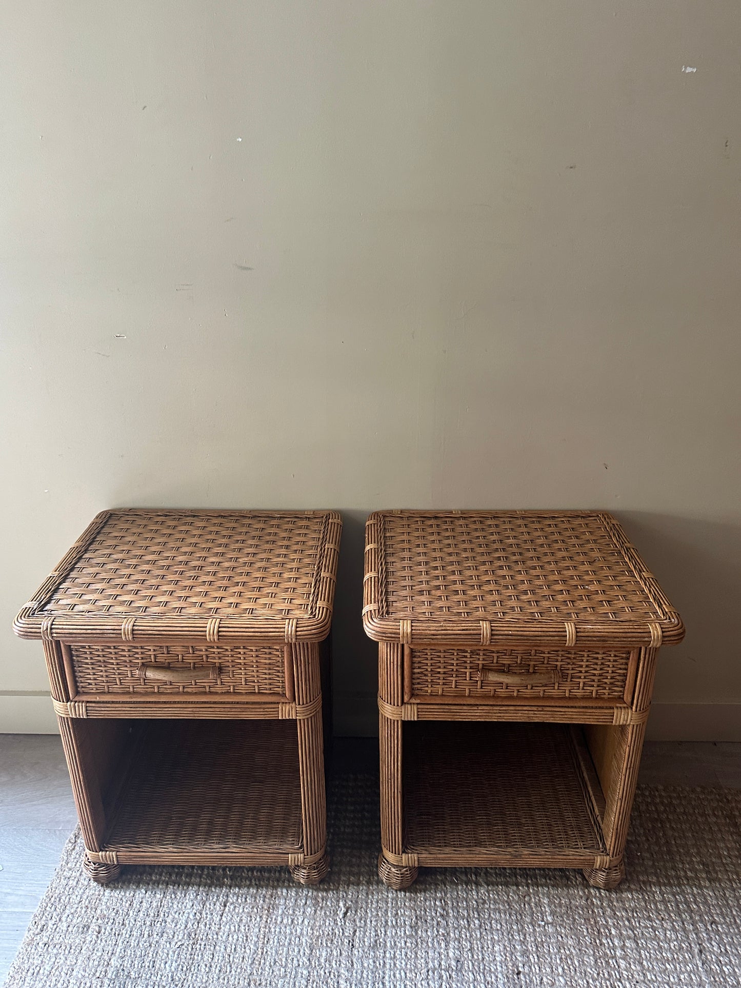 Wicker bedside tables. Sold individually.