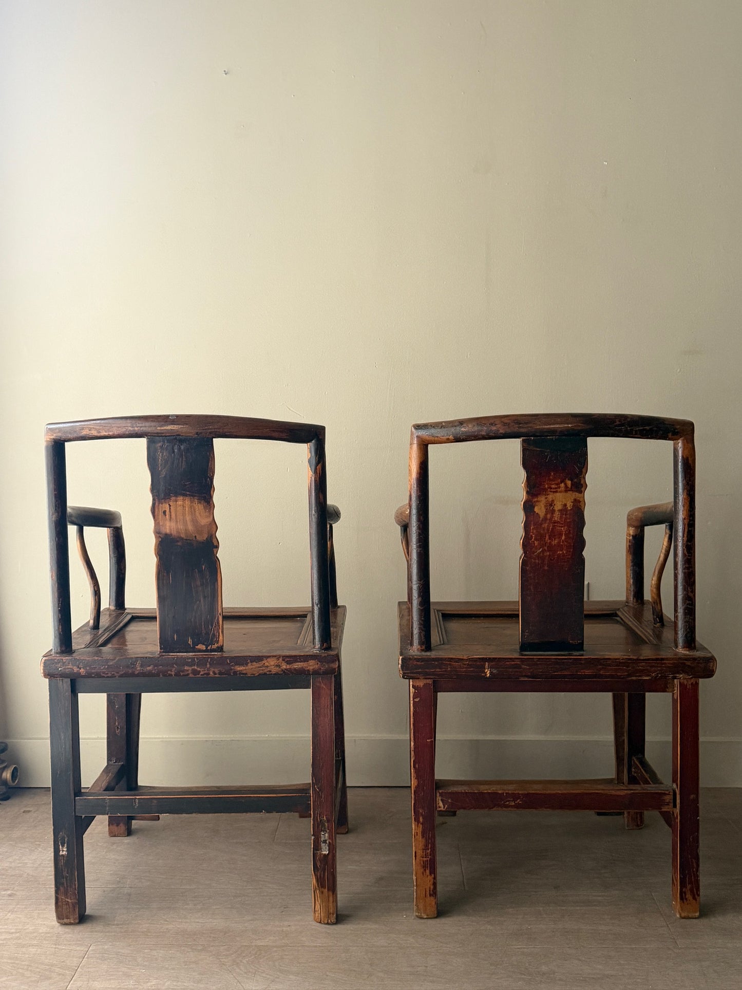 Chinese elmwood chairs. Sold individually.