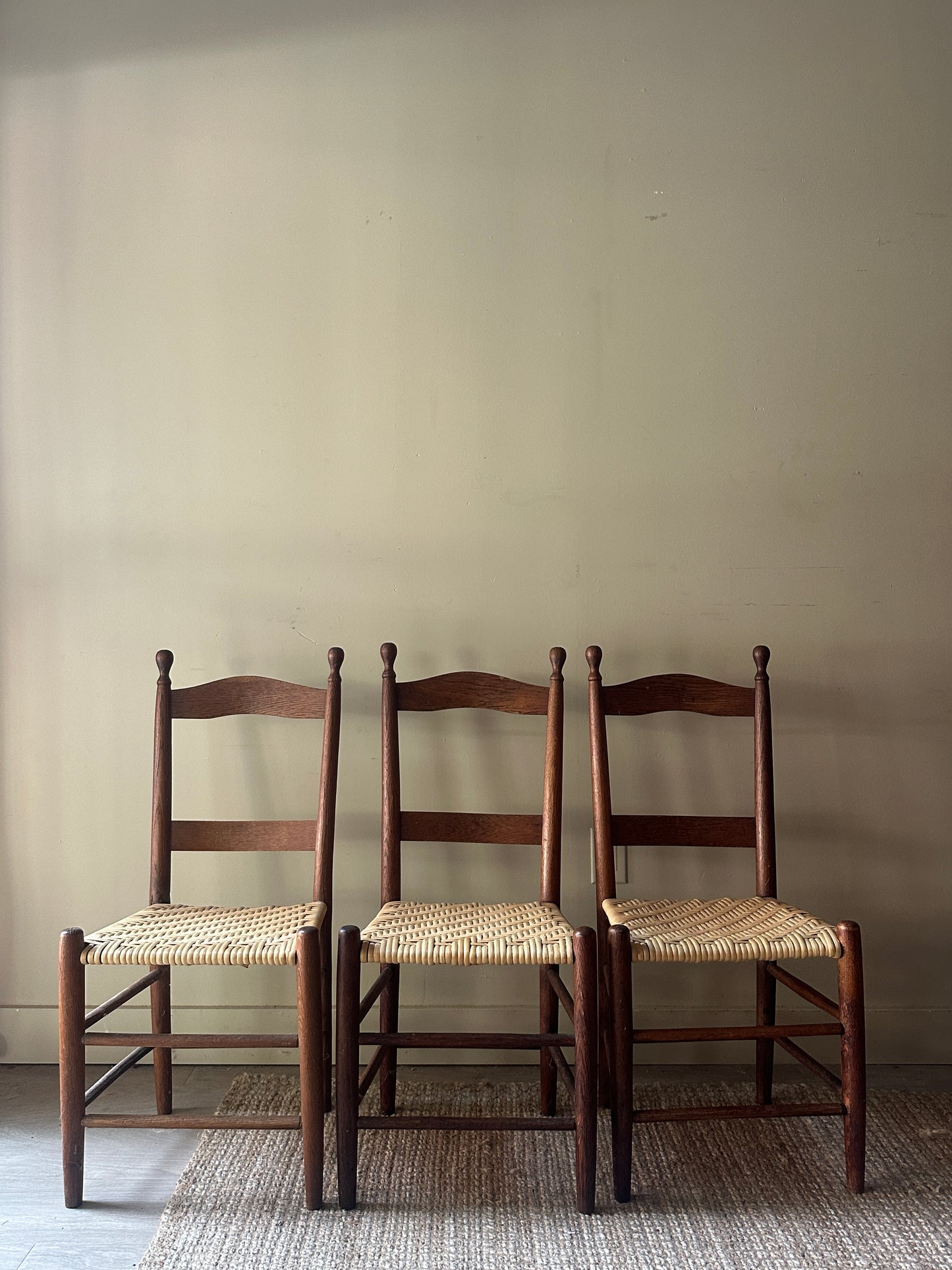 Woven seat chairs. Sold individually.