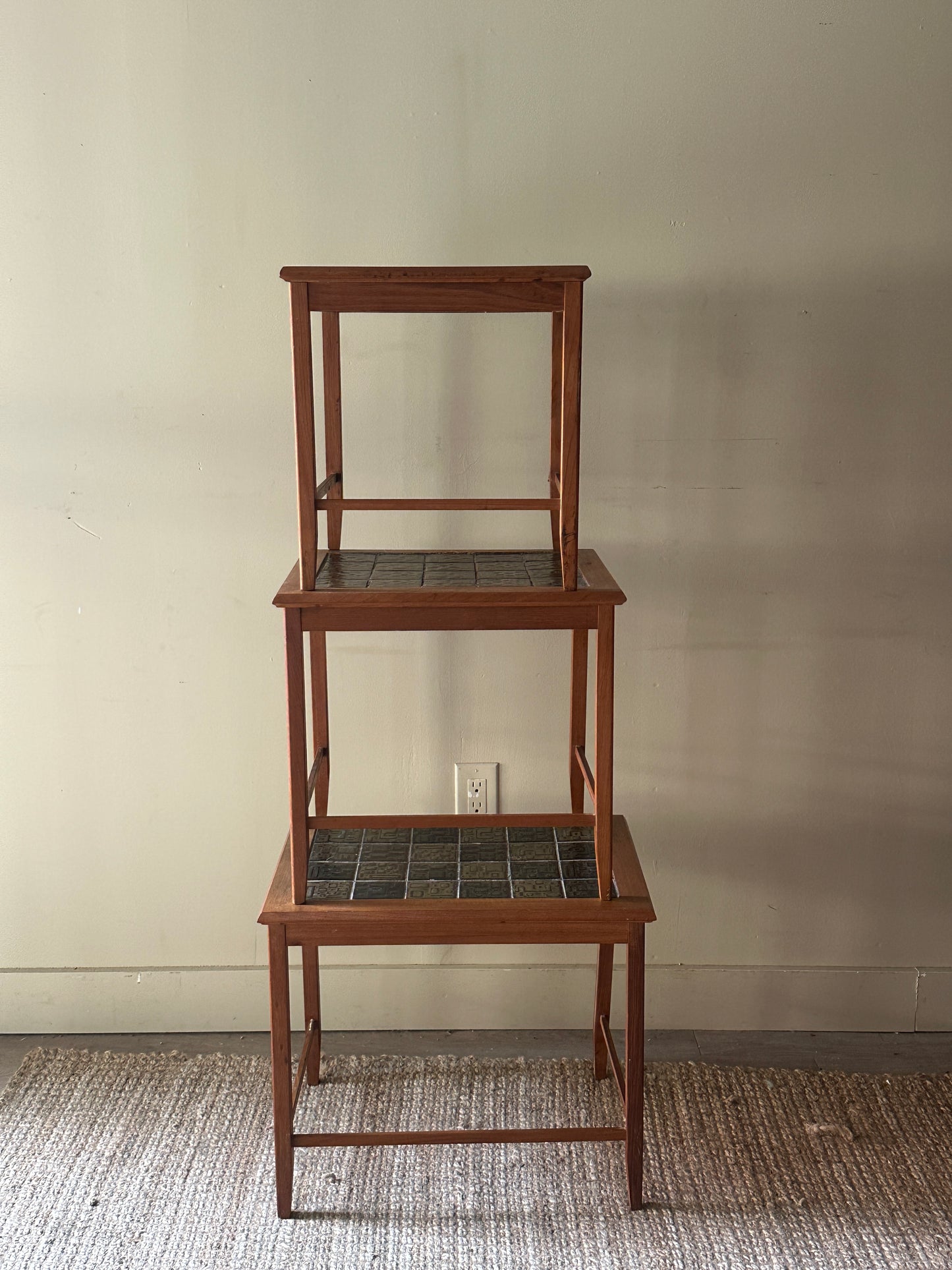 Tile top teak nesting tables
