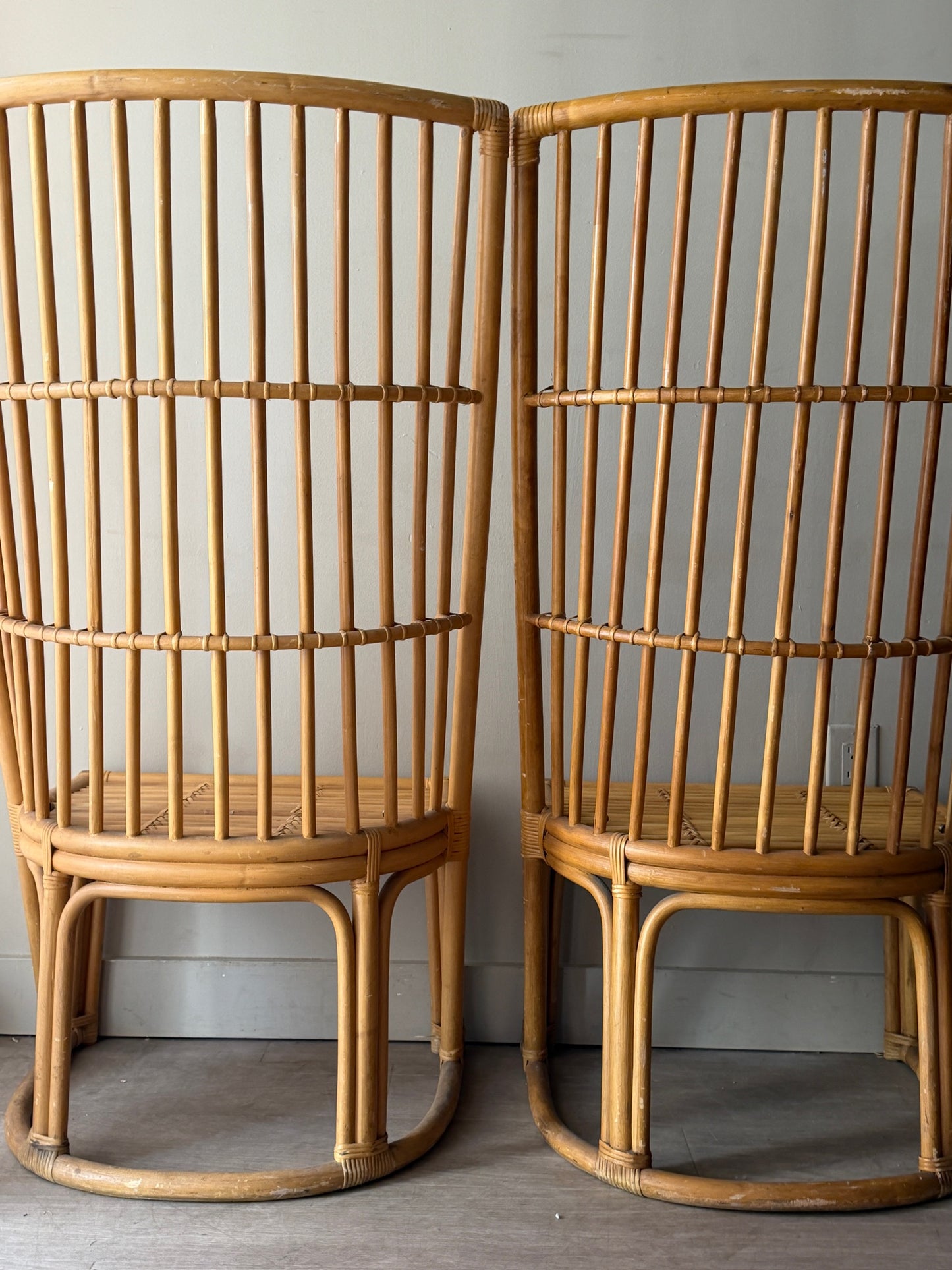 Rattan chairs. Sold individually.