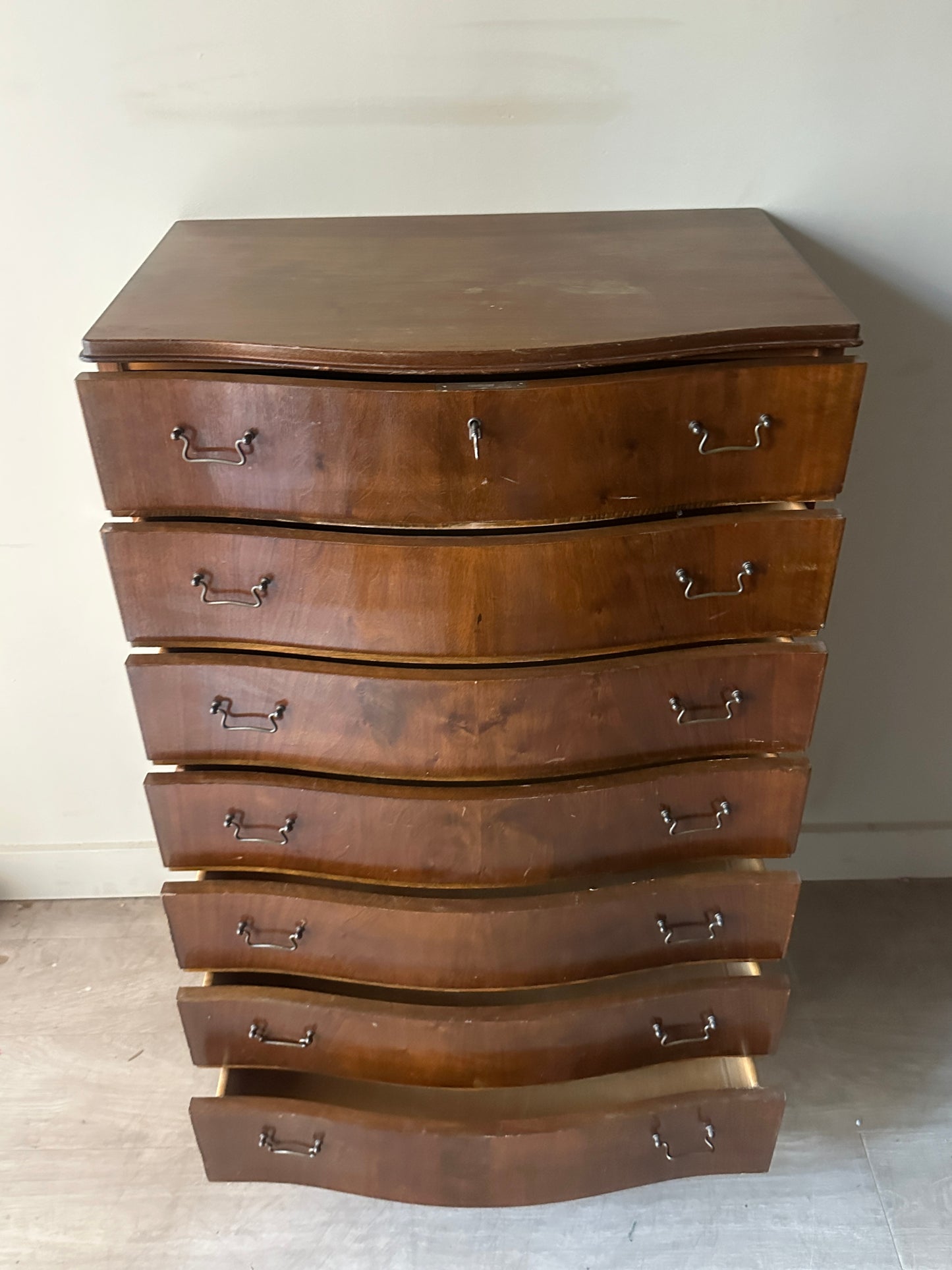 Walnut serpentine front dresser