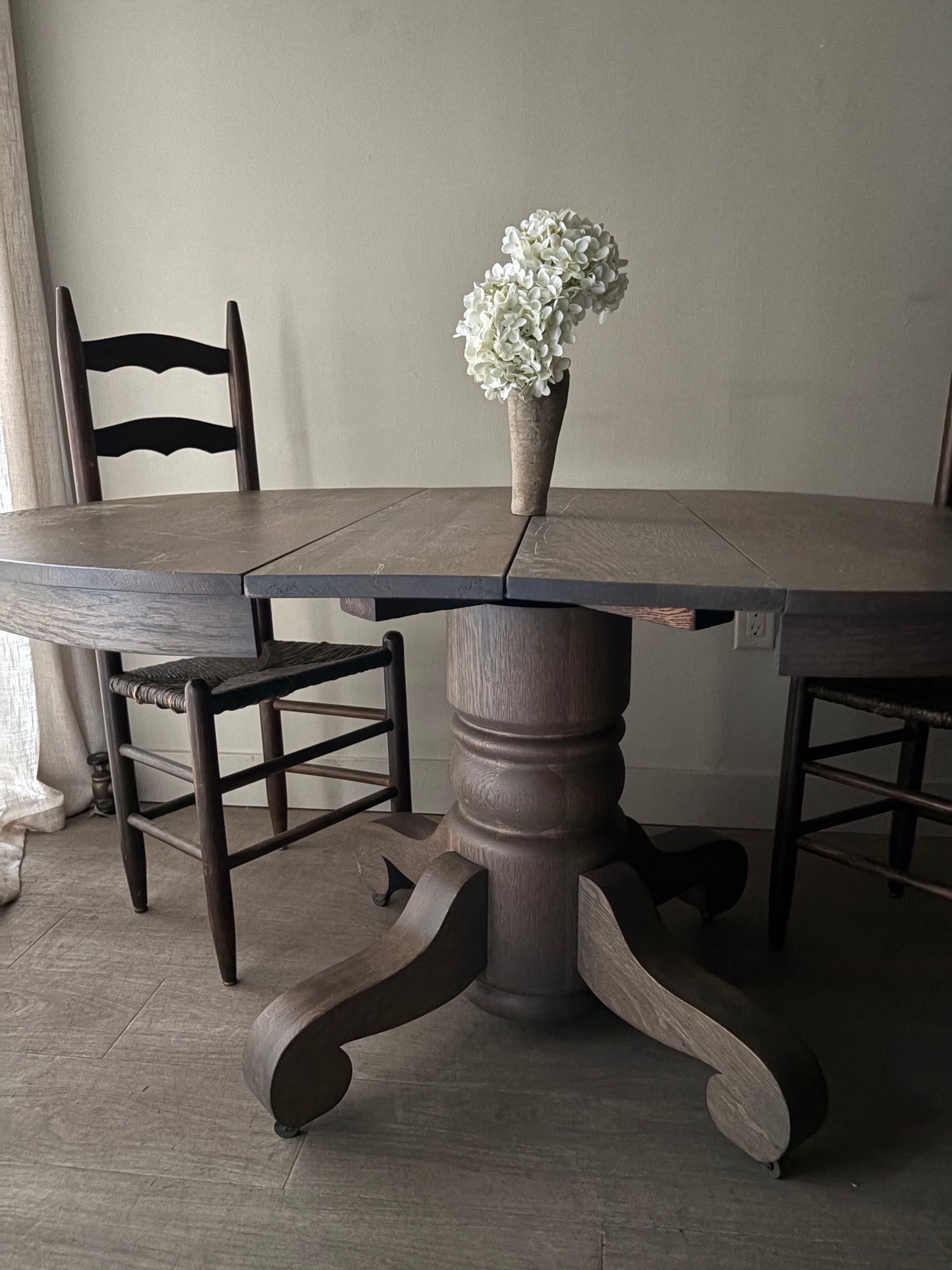 Golden oak dining table with extensions