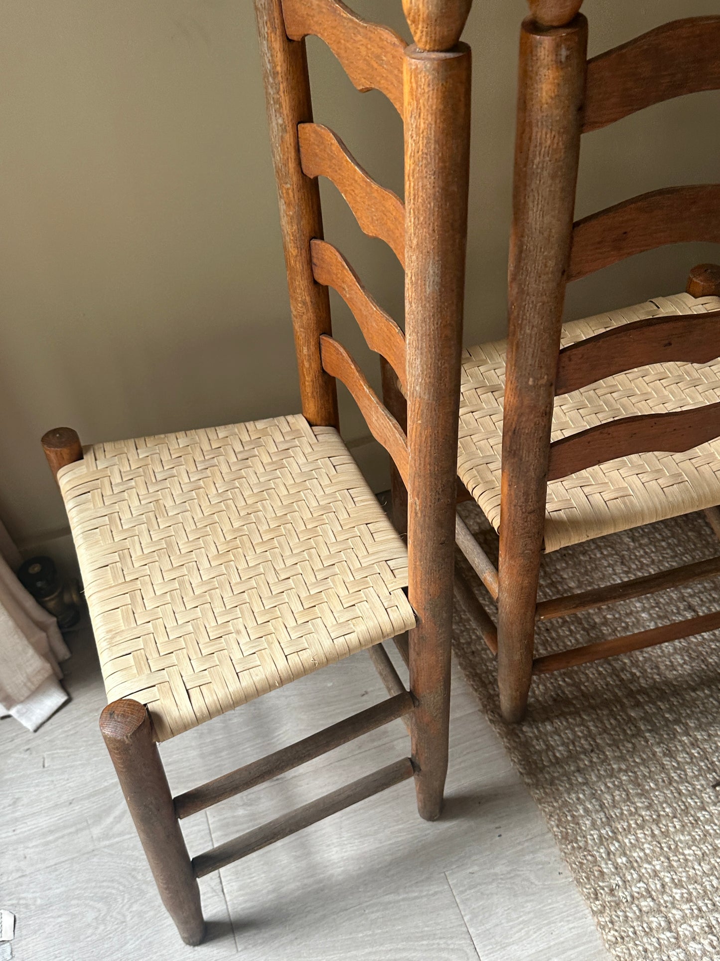 Woven ladder back chairs. Sold as set of 4.