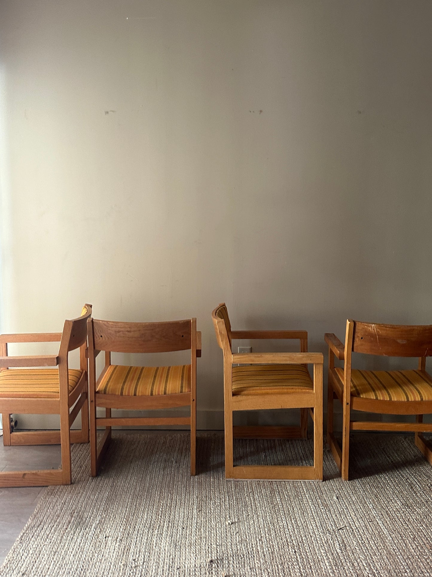 Oak armchairs. Sold individually.