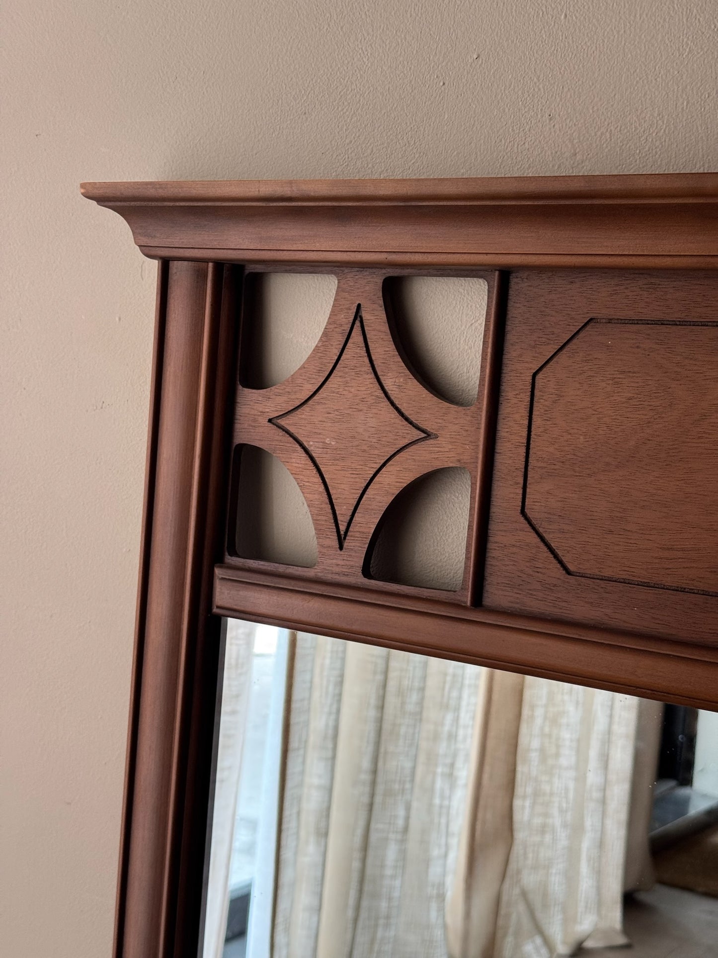 Carved walnut mirror