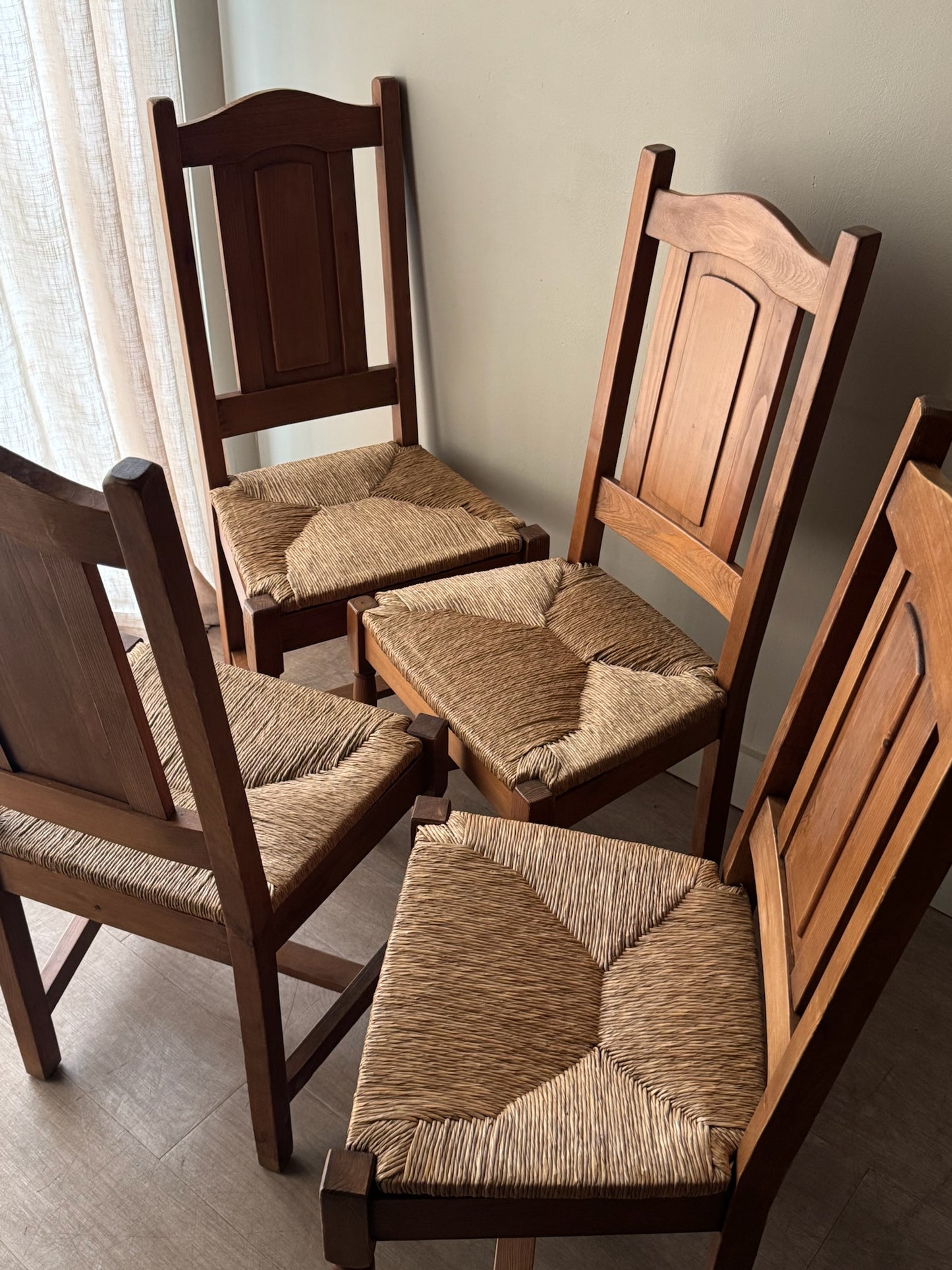 Dutch oak rush seat dining chairs. Sold in pairs.