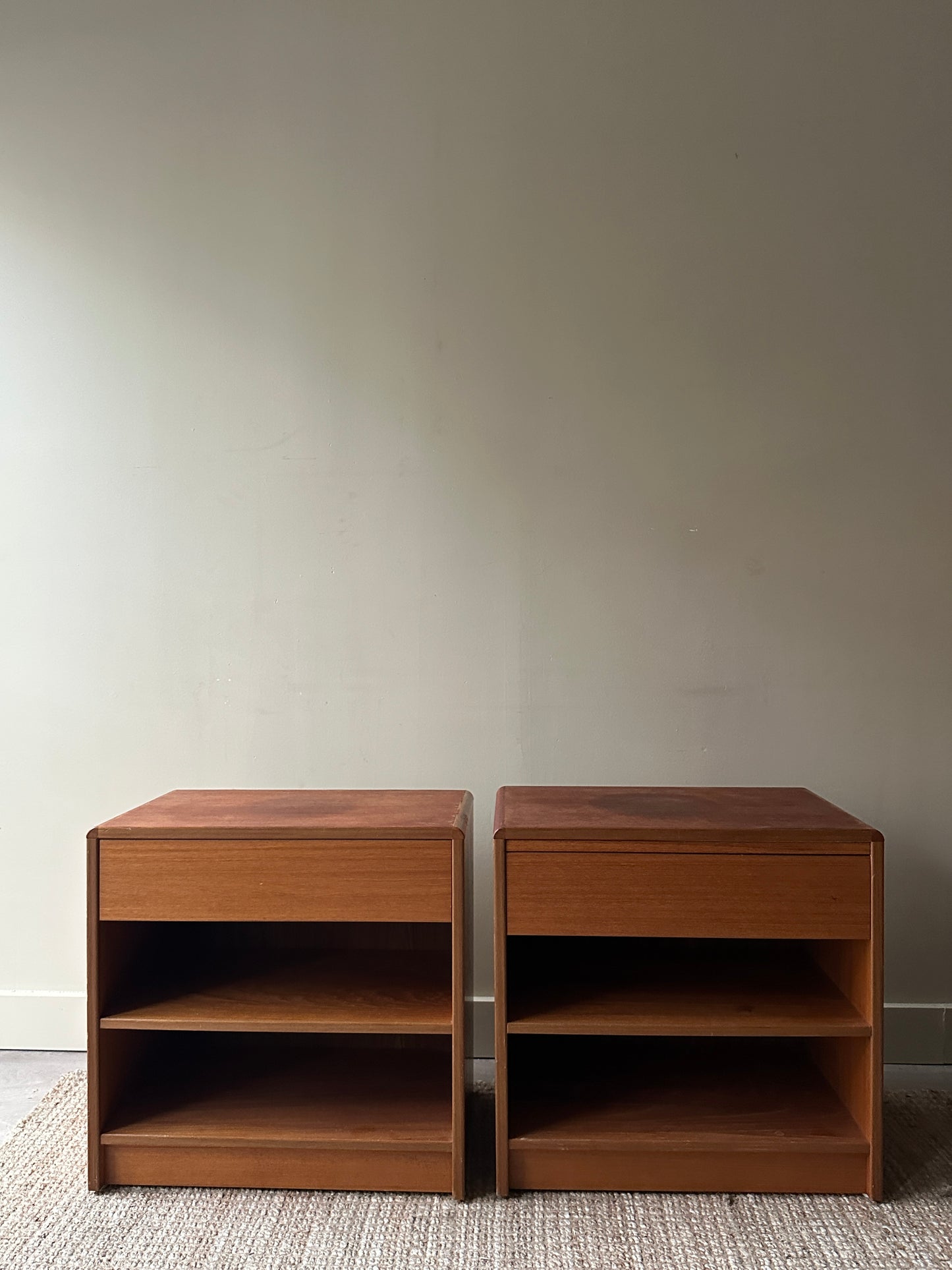 Teak bedside tables. Sold together.