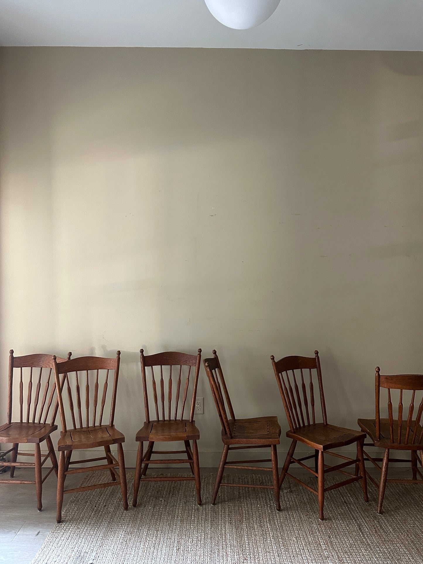 6 Oak dining chairs. Sold in pairs.