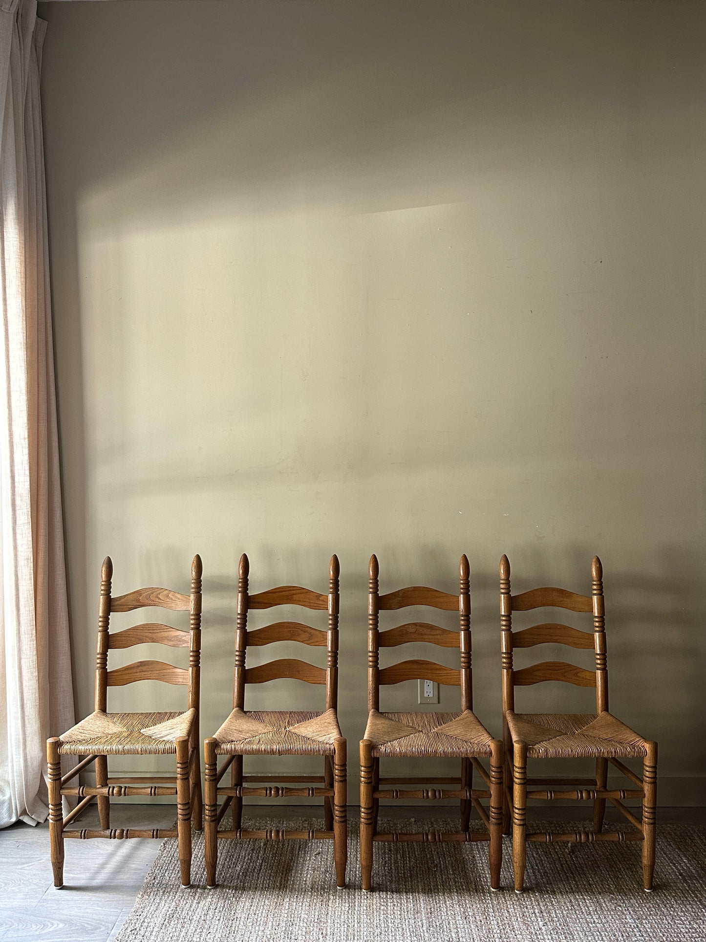 Ladder back chairs. Sold in pairs.