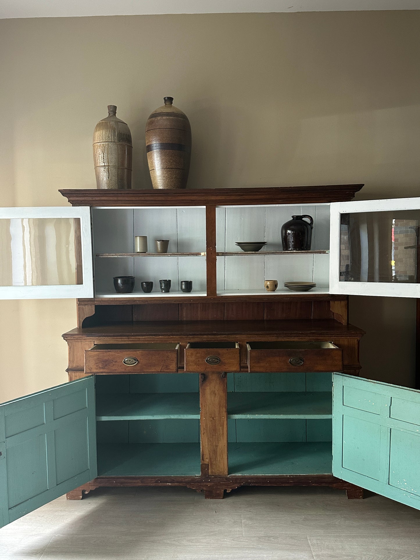 Pennsylvania Dutch two piece pine cupboard