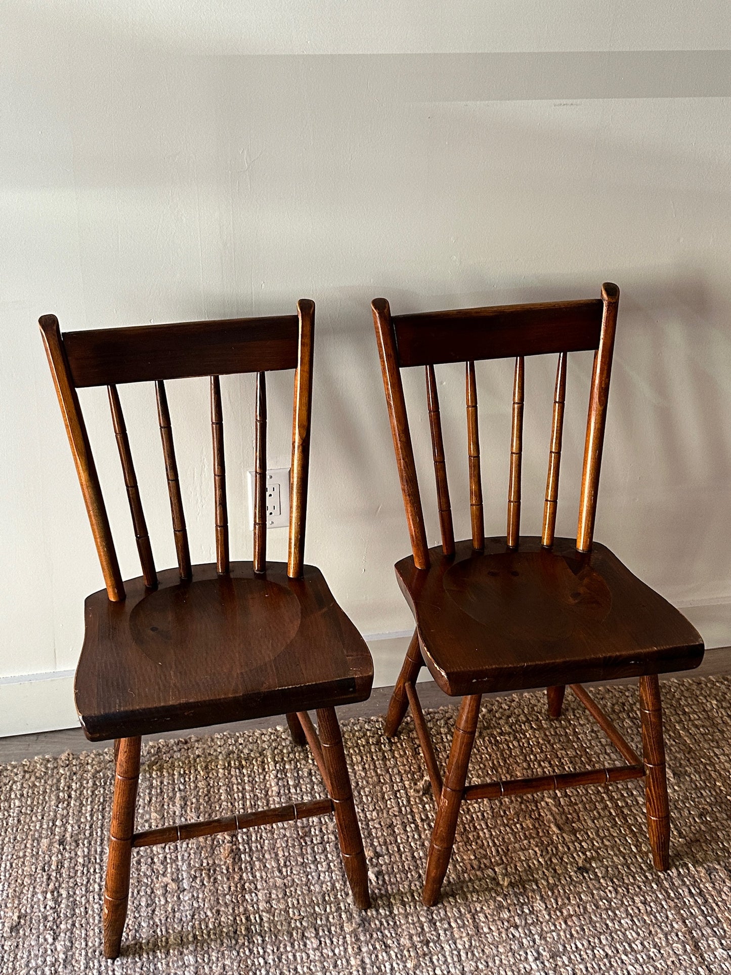 Pair of carved plank seat chairs