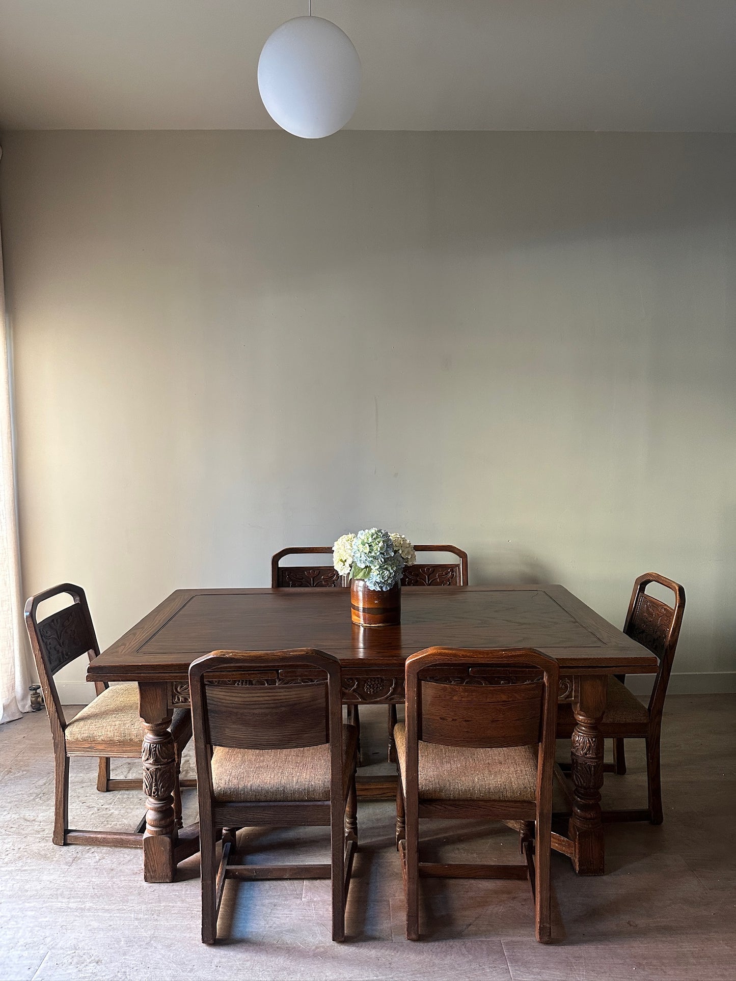 Oak Tudor revival dining table with extensions