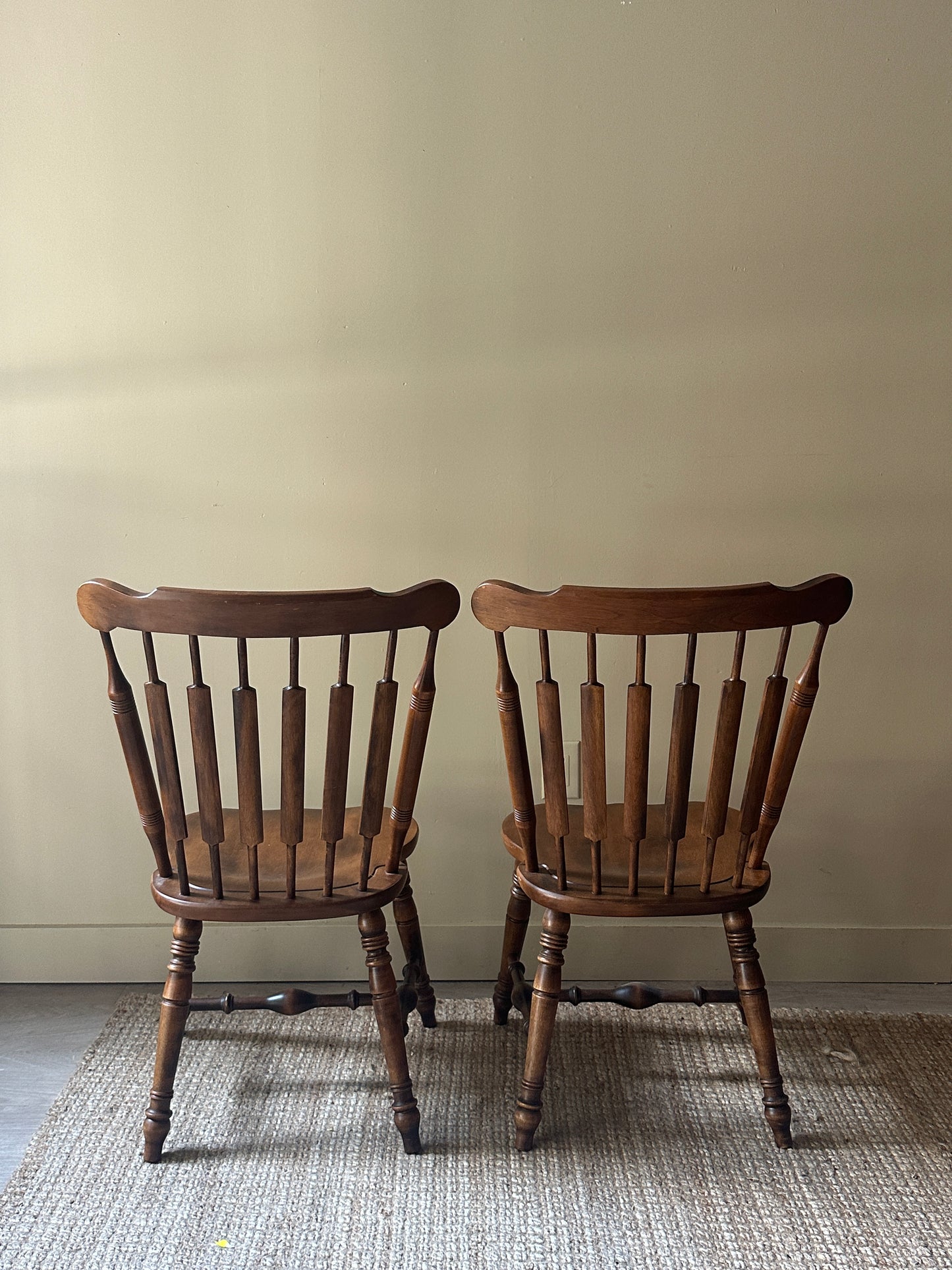 Windsor walnut chairs. Sold in pair.