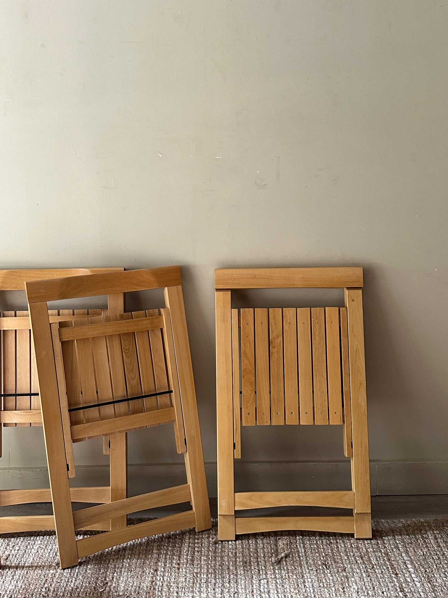 Oak folding chairs. Sold in pairs.