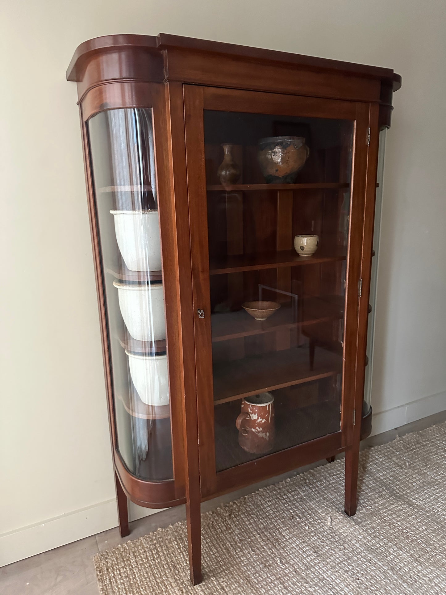 Walnut curio cabinet