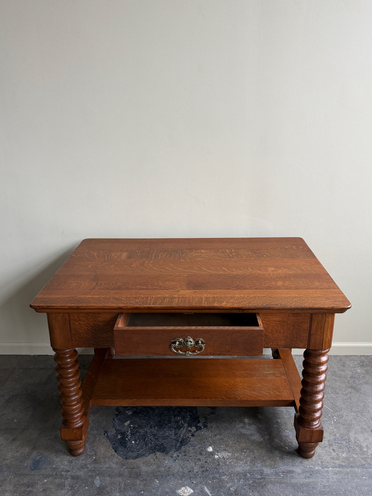 Golden oak spindle leg library table