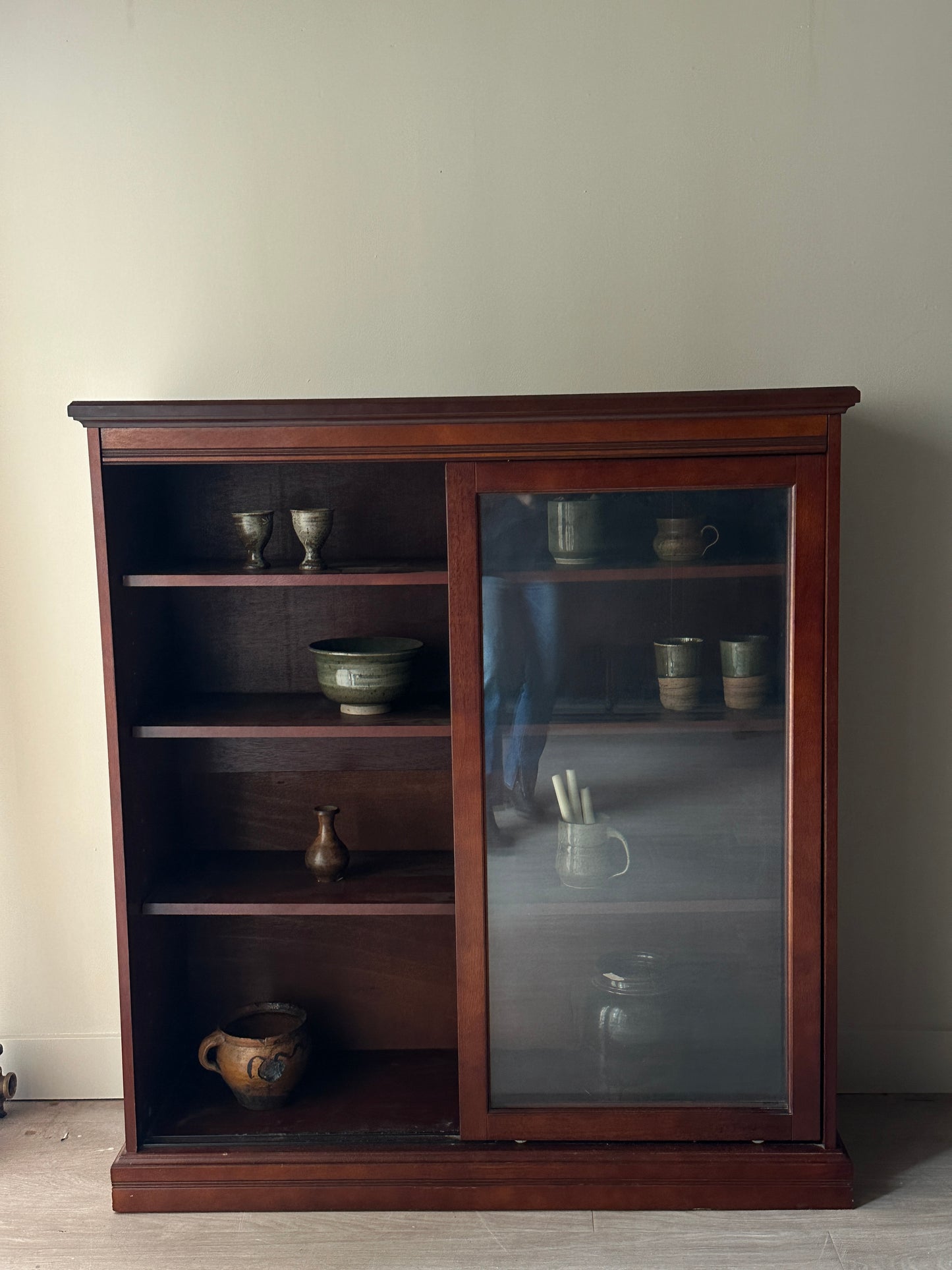 Glass sliding door display case